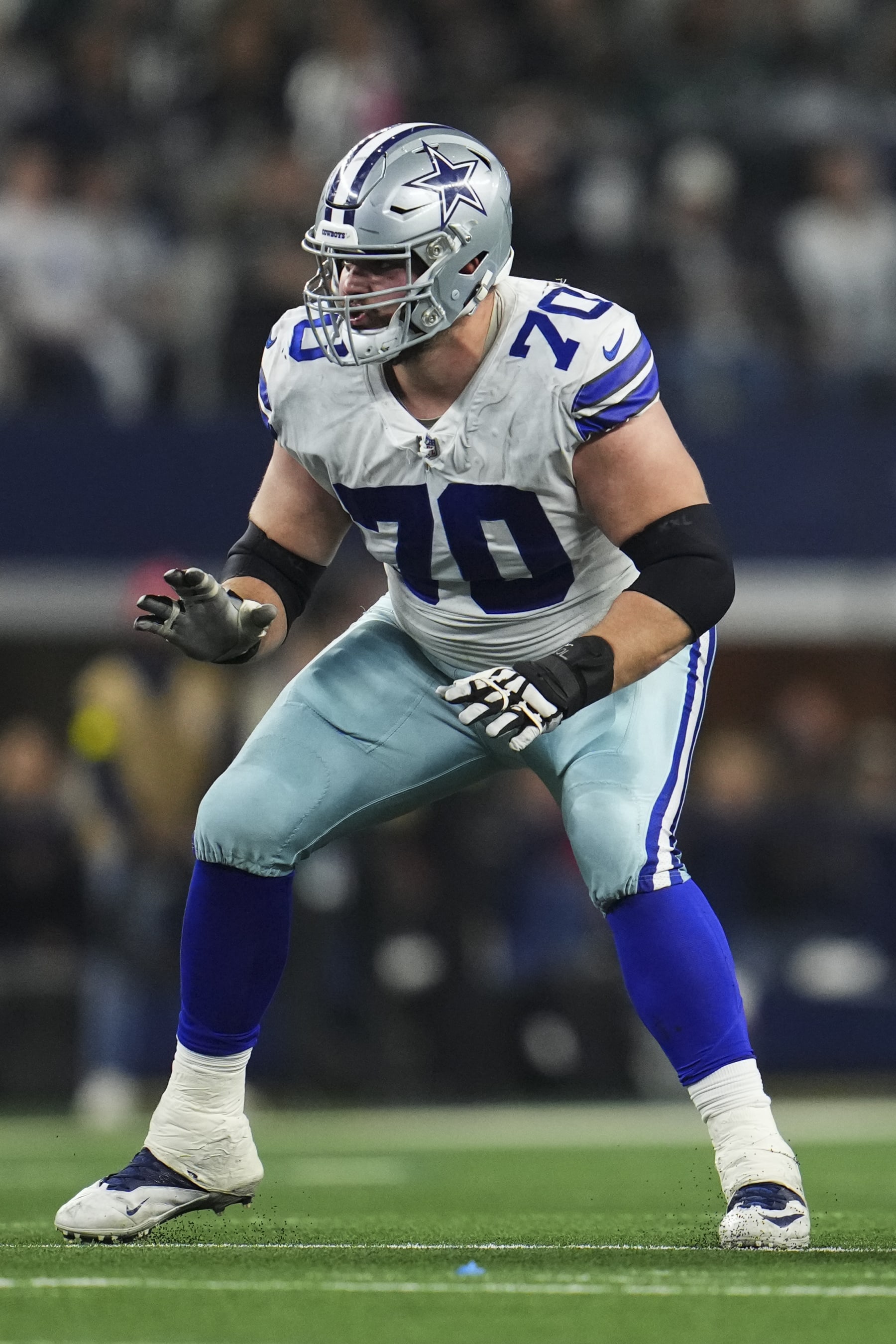 ARLINGTON, TX - DECEMBER 24: Zack Martin #70 of the Dallas Cowboys defends against the Philadelphia Eagles at AT&T Stadium on December 24, 2022 in Arlington, Texas. (Photo by Cooper Neill/Getty Images)