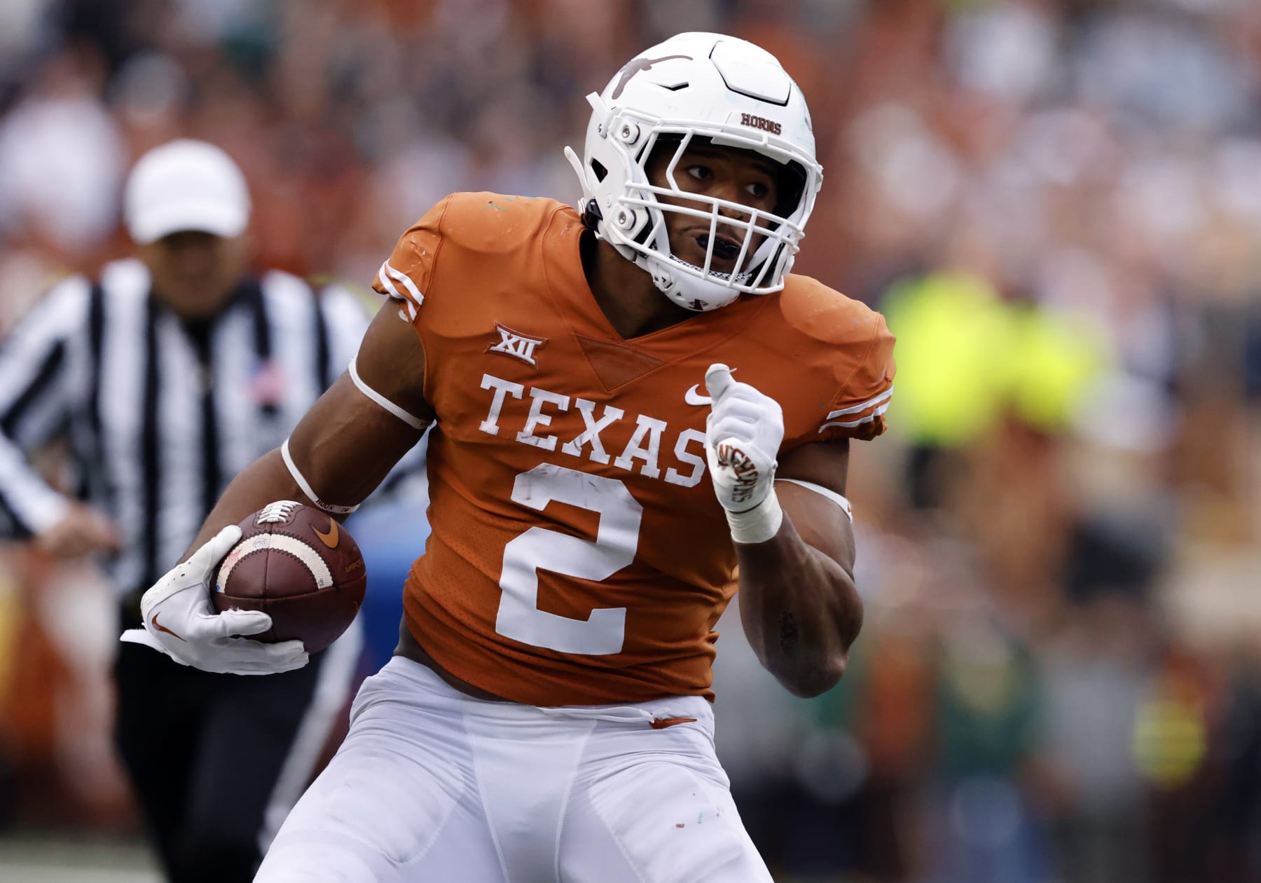 AUSTIN, TX - NOVEMBER 25: Texas running back Roschon Johnson (2) runs the ball during the game against the Baylor Bears on November 25, 2022, at Darrell K Royal - Texas Memorial Stadium in Austin, TX. (Photo by Adam Davis/Icon Sportswire via Getty Images)