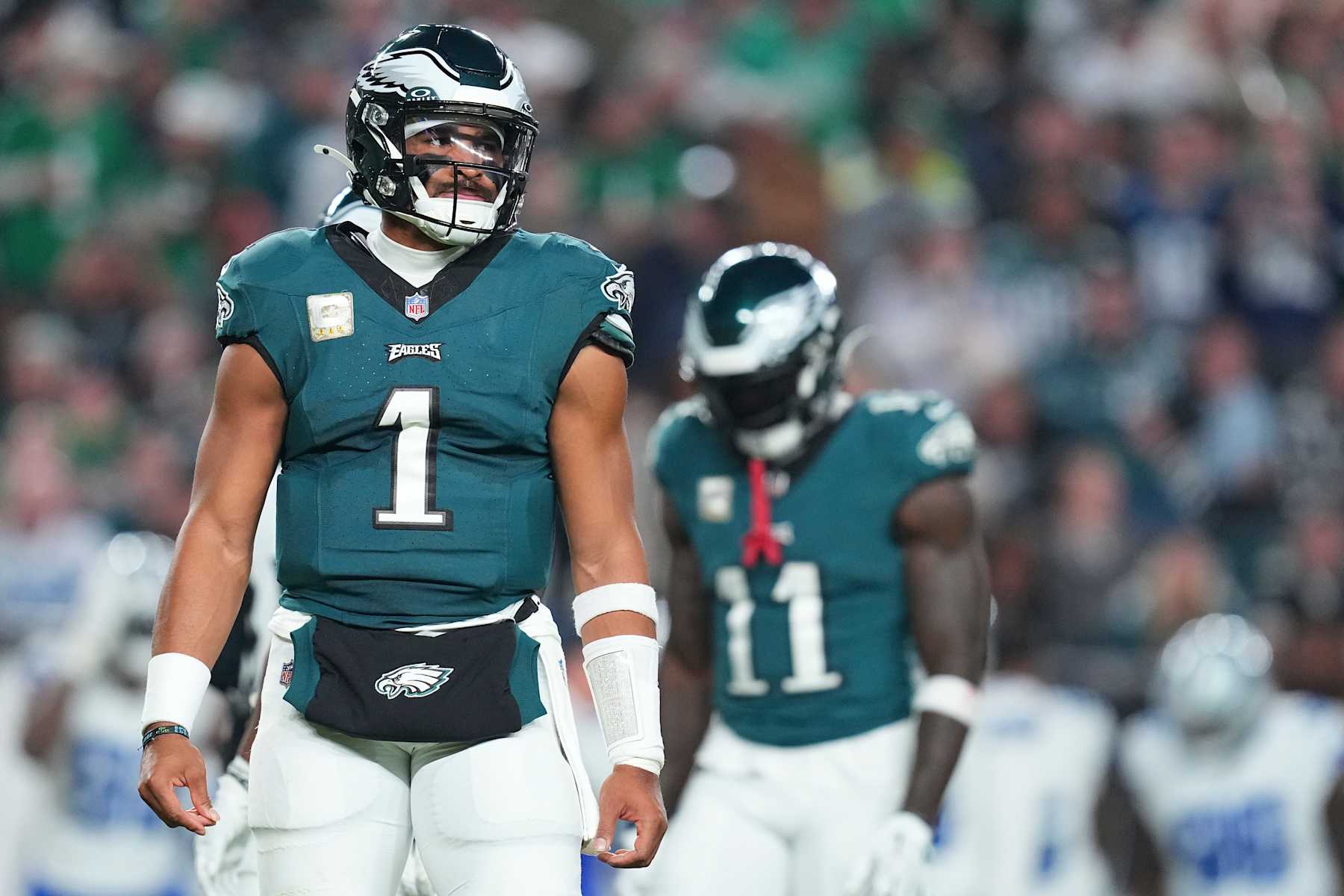 PHILADELPHIA, PENNSYLVANIA - NOVEMBER 5: Jalen Hurts #1 and A.J. Brown #11 of the Philadelphia Eagles look on against the Dallas Cowboys at Lincoln Financial Field on November 5, 2023 in Philadelphia, Pennsylvania. (Photo by Mitchell Leff/Getty Images)