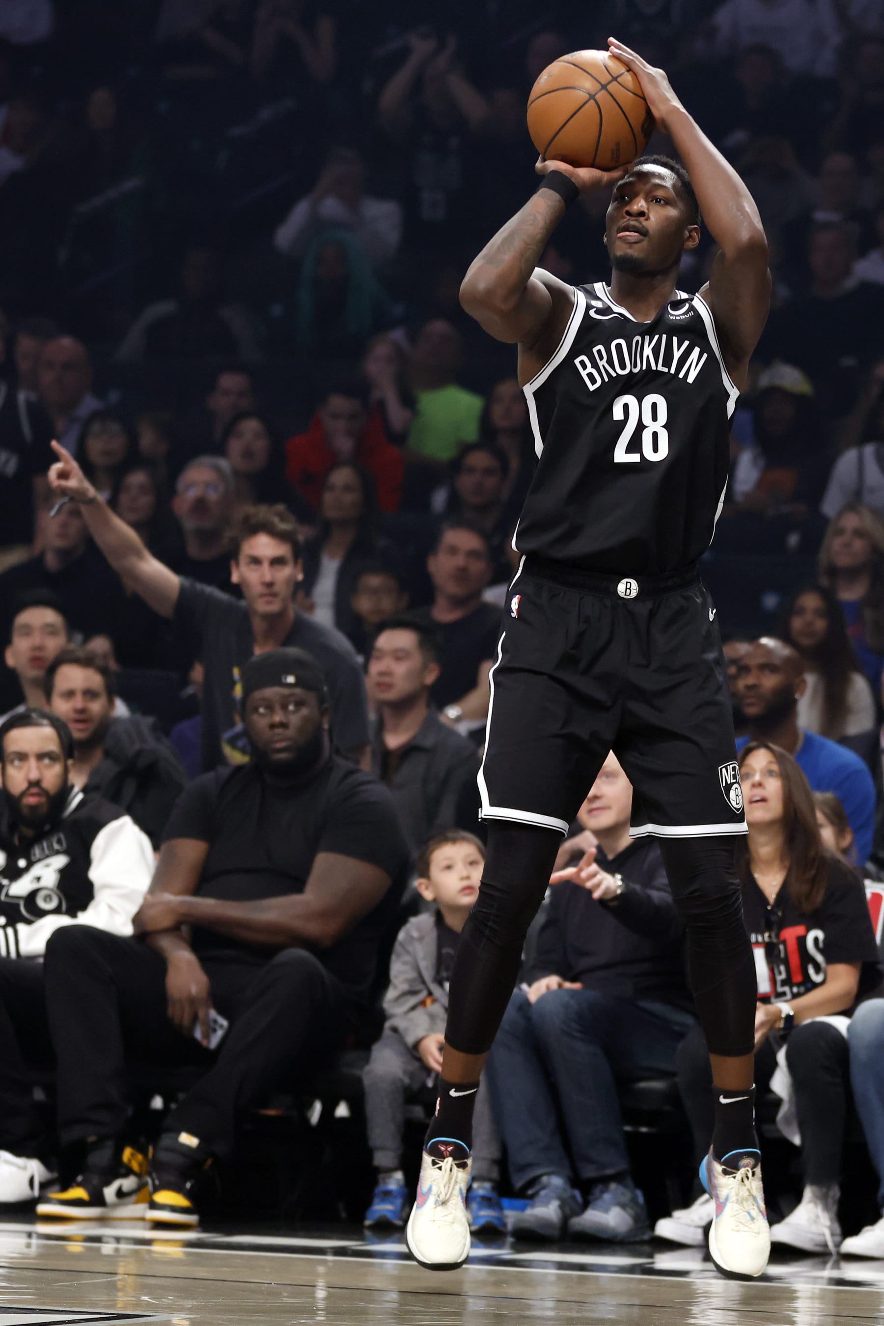 NEW YORK, NEW YORK - APRIL 22: Dorian Finney-Smith #28 of the Brooklyn Nets shoots the ball against the Philadelphia 76ers during the first half of Game Four of the Eastern Conference First Round Playoffs at Barclays Center on April 22, 2023 in the Brooklyn borough of New York City. NOTE TO USER: User expressly acknowledges and agrees that, by downloading and or using this photograph, User is consenting to the terms and conditions of the Getty Images License Agreement. (Photo by Sarah Stier/Getty Images)
