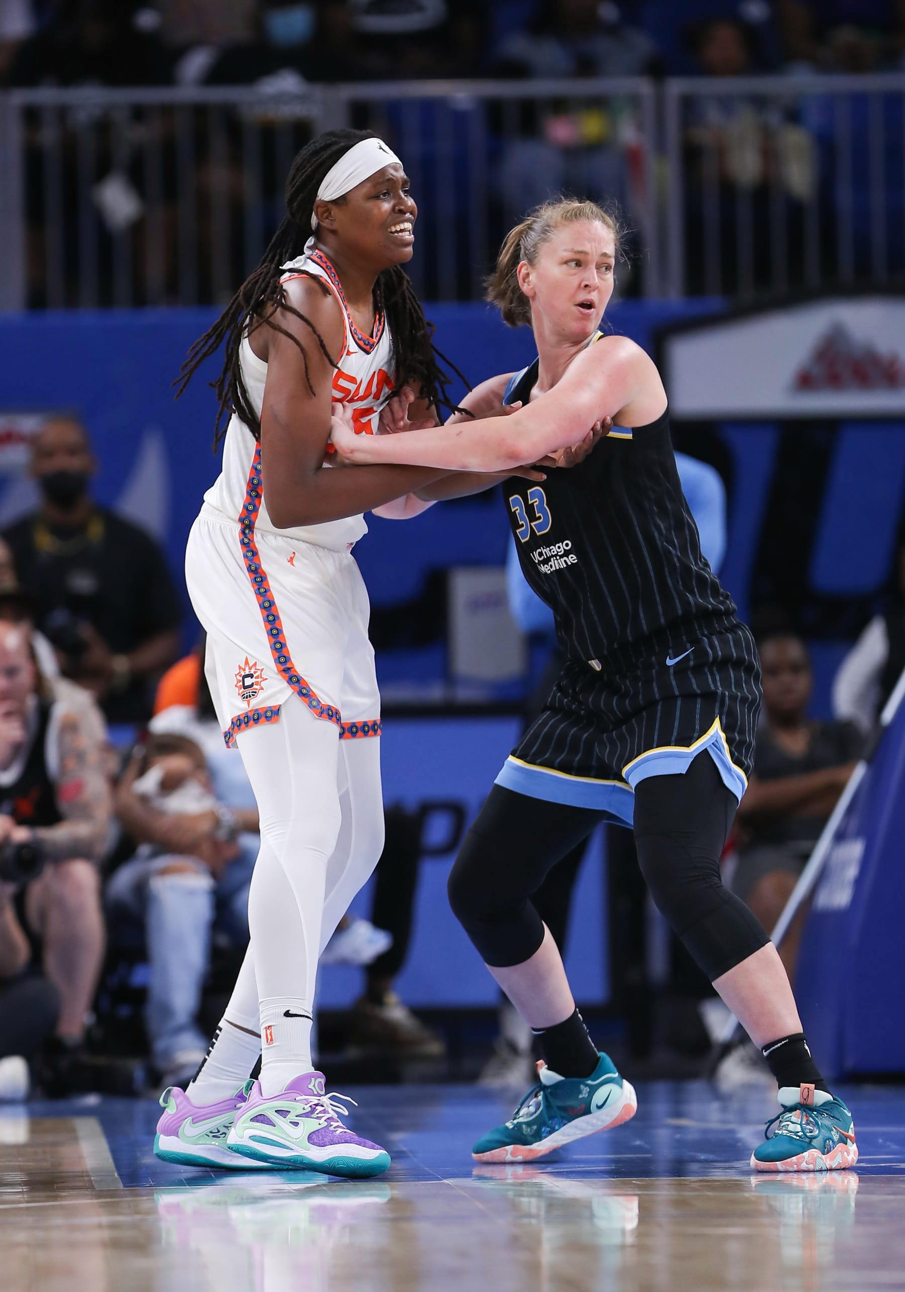 CHICAGO, IL - AUGUST 07: Connecticut Sun forward Jonquel Jones (35) and Chicago Sky forward Emma Meesseman (33) fight for position during a WNBA game between the Connecticut Sun and the Chicago Sky on August 7, 2022, at Wintrust Arena in Chicago, IL. (Photo by Melissa Tamez/Icon Sportswire via Getty Images)
