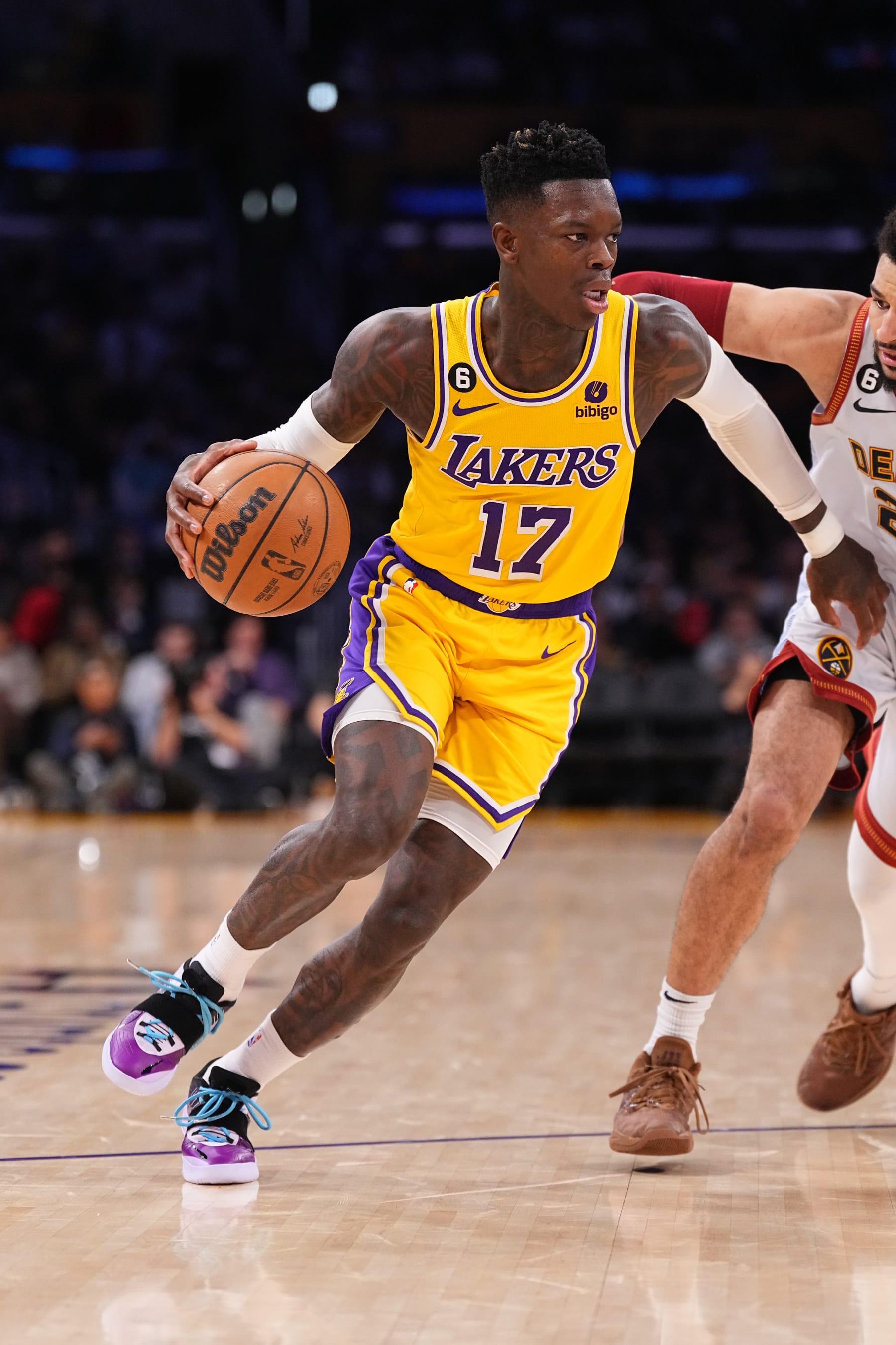 LOS ANGELES, CA - MAY 22: Dennis Schroder #17 of the Los Angeles Lakers dribbles the ball during Game Four of the Western Conference Finals against the Denver Nuggets on May 22, 2023 at Crypto.com Arena in Los Angeles, California. NOTE TO USER: User expressly acknowledges and agrees that, by downloading and/or using this Photograph, user is consenting to the terms and conditions of the Getty Images License Agreement. Mandatory Copyright Notice: Copyright 2023 NBAE (Photo by Garrett Ellwood/NBAE via Getty Images)