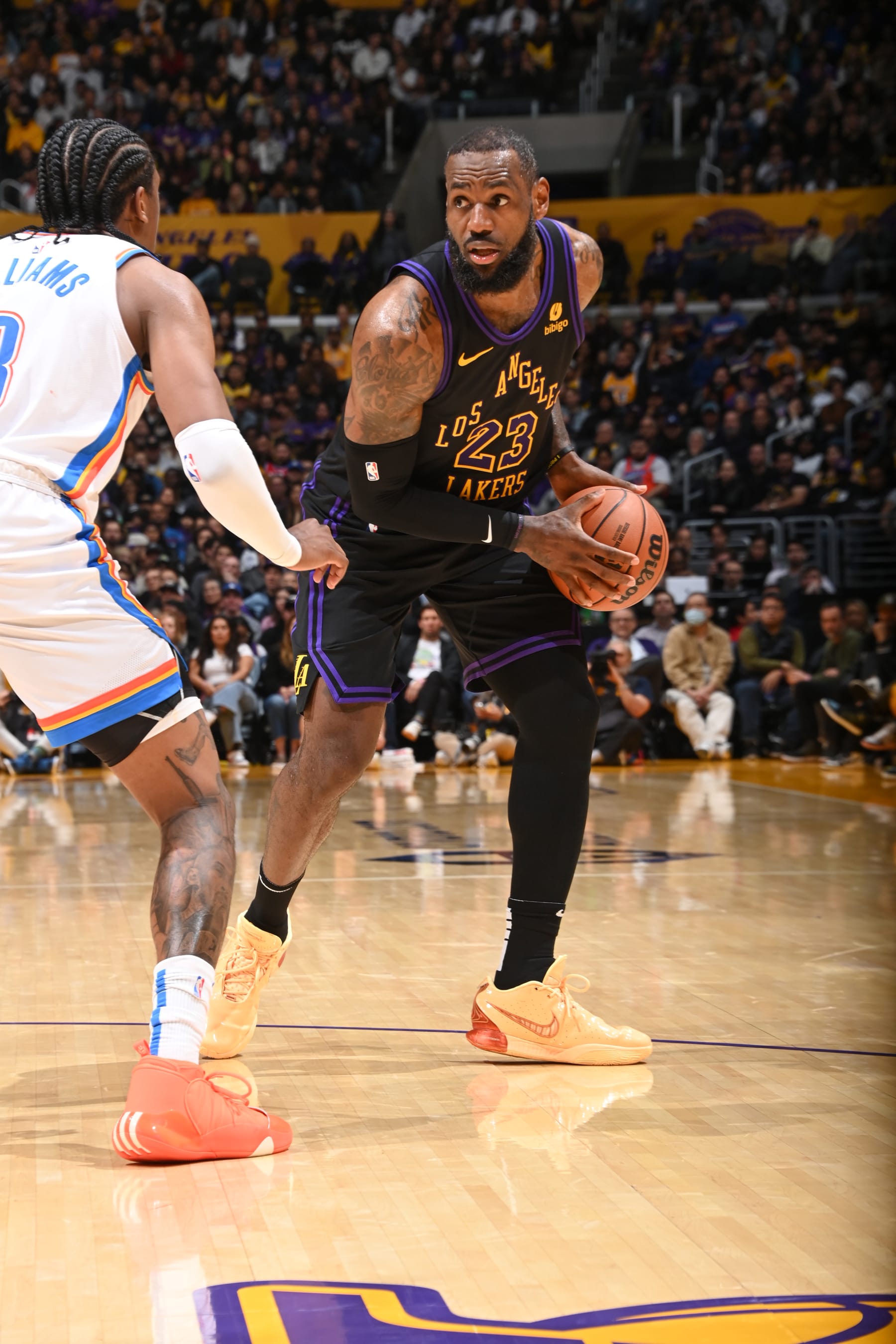 LOS ANGELES, CA - JANUARY 15:  LeBron James #23 of the Los Angeles Lakers handles the ball during the game  on January 15, 2024 at Crypto.Com Arena in Los Angeles, California. NOTE TO USER: User expressly acknowledges and agrees that, by downloading and/or using this Photograph, user is consenting to the terms and conditions of the Getty Images License Agreement. Mandatory Copyright Notice: Copyright 2024 NBAE (Photo by Andrew D. Bernstein/NBAE via Getty Images)