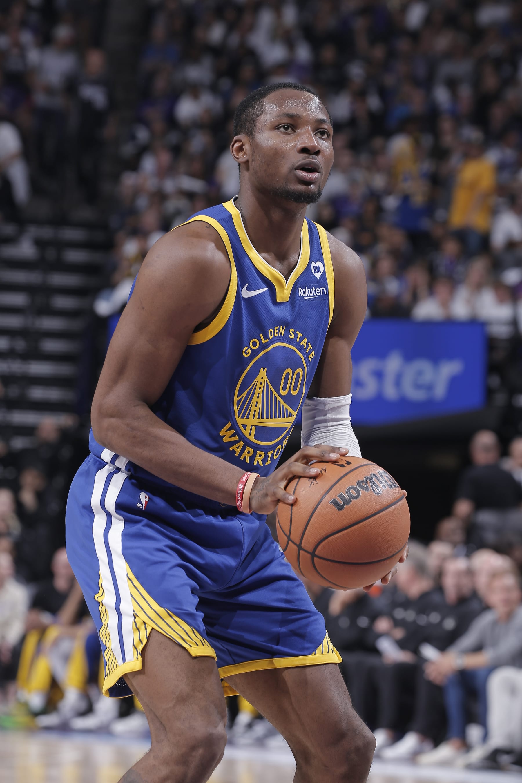 SACRAMENTO, CA - APRIL 16: Jonathan Kuminga #00 of the Golden State Warriors shoots a free throw during the game against the Sacramento Kings during the 2024 Play-In Tournament on April 16, 2024 at Golden 1 Center in Sacramento, California. NOTE TO USER: User expressly acknowledges and agrees that, by downloading and or using this photograph, User is consenting to the terms and conditions of the Getty Images Agreement. Mandatory Copyright Notice: Copyright 2024 NBAE (Photo by Rocky Widner/NBAE via Getty Images)