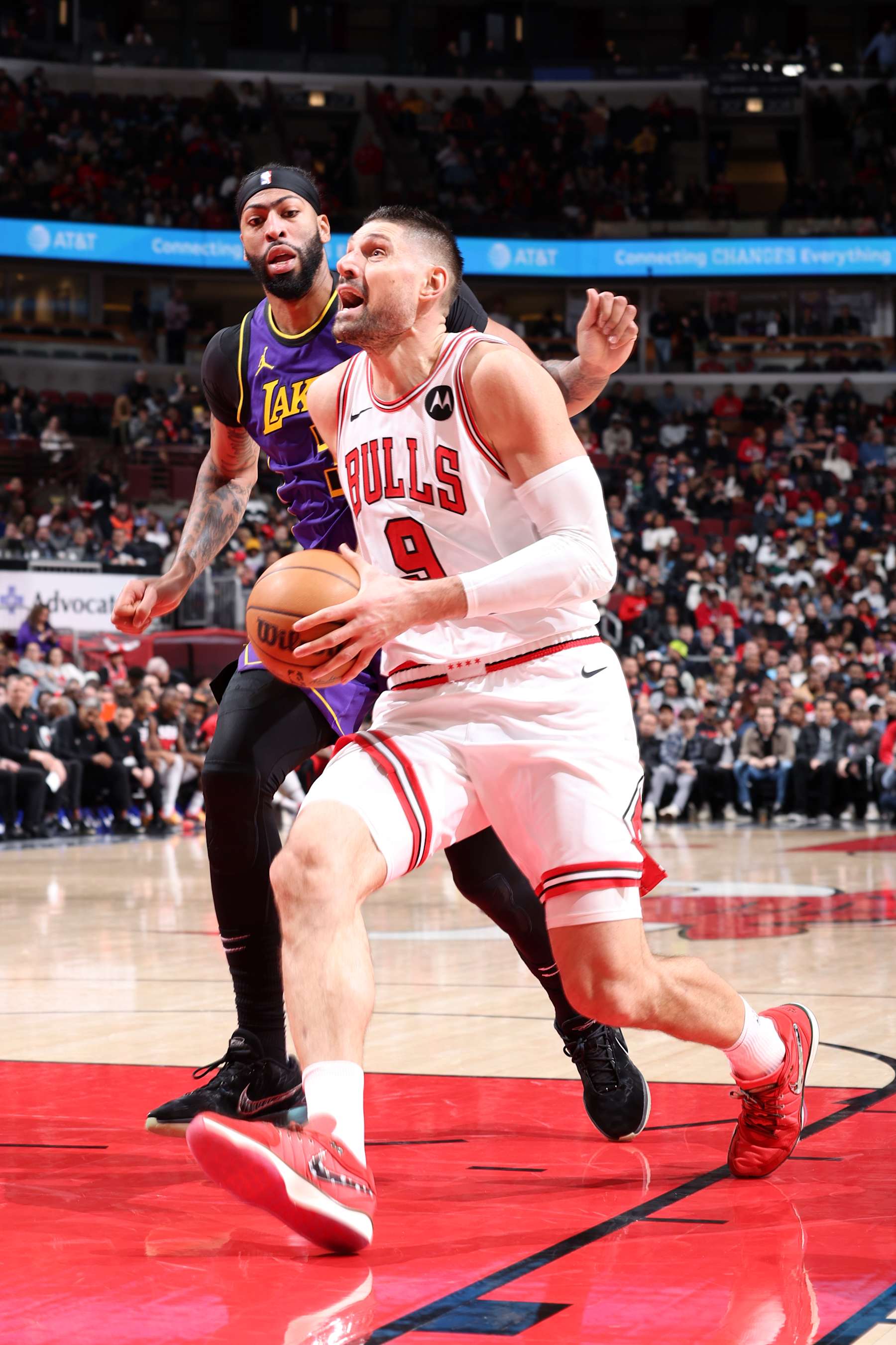 CHICAGO, IL - DECEMBER 20:  Nikola Vucevic #9 of the Chicago Bulls drives to the basket during the game against the Los Angeles Lakers on December 20, 2023 at United Center in Chicago, Illinois. NOTE TO USER: User expressly acknowledges and agrees that, by downloading and or using this photograph, User is consenting to the terms and conditions of the Getty Images License Agreement. Mandatory Copyright Notice: Copyright 2023 NBAE (Photo by Jeff Haynes/NBAE via Getty Images)
