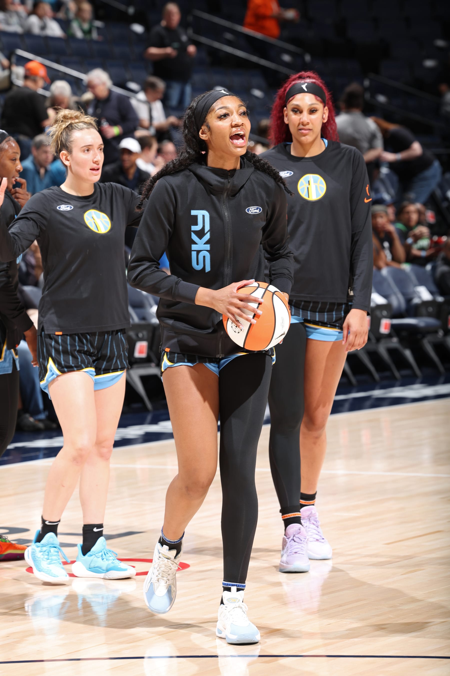 MINNEAPOLIS, MN -  MAY 3: Angel Reese #5 of the Chicago Sky looks on before the game against the Minnesota Lynx on May 3, 2024 at Target Center in Minneapolis, Minnesota. NOTE TO USER: User expressly acknowledges and agrees that, by downloading and or using this Photograph, user is consenting to the terms and conditions of the Getty Images License Agreement. Mandatory Copyright Notice: Copyright 2024 NBAE (Photo by David Sherman/NBAE via Getty Images)