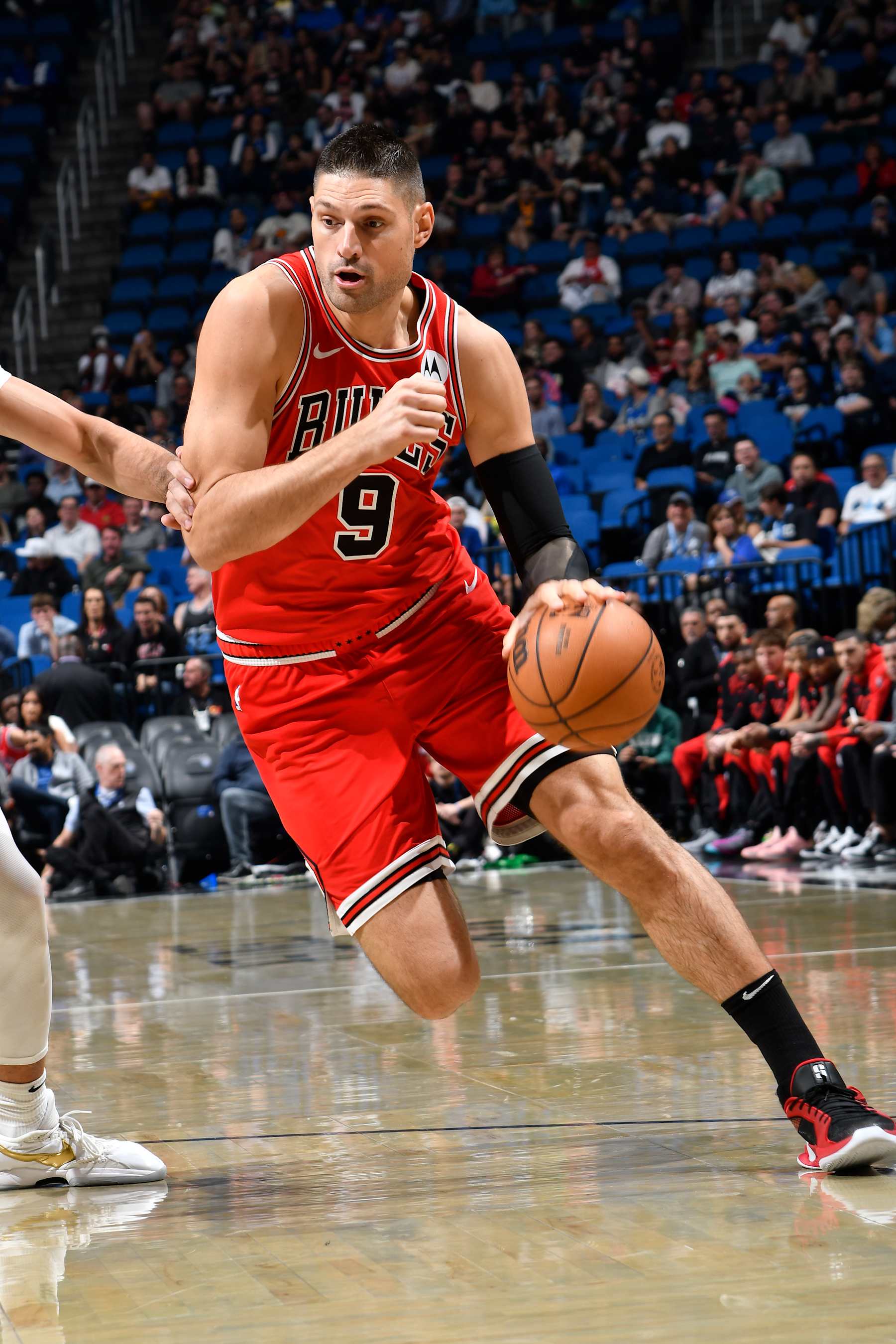 ORLANDO, FL - NOVEMBER 27: Nikola Vucevic #9 of the Chicago Bulls handles the ball during the game against the Orlando Magic on November 27, 2024 at Kia Center in Orlando, Florida. NOTE TO USER: User expressly acknowledges and agrees that, by downloading and or using this photograph, User is consenting to the terms and conditions of the Getty Images License Agreement. Mandatory Copyright Notice: Copyright 2024 NBAE (Photo by Fernando Medina/NBAE via Getty Images)