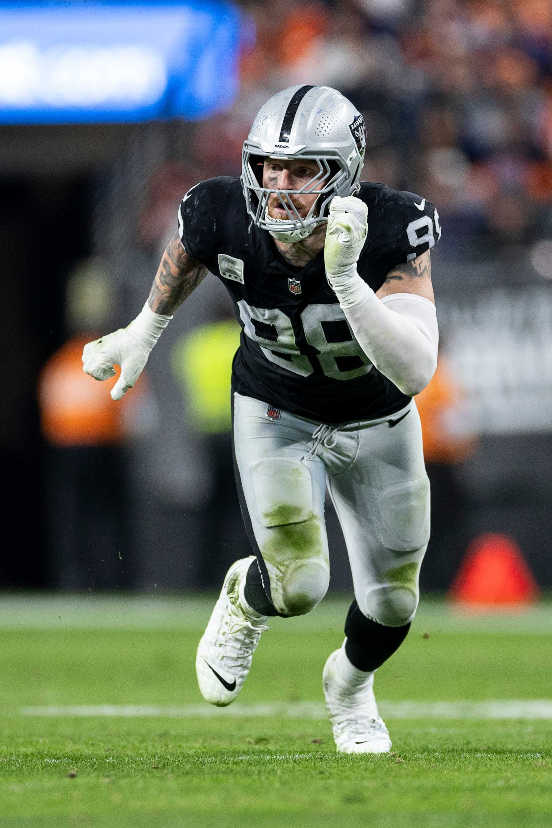 LAS VEGAS, NEVADA - NOVEMBER 24: Maxx Crosby #98 of the Las Vegas Raiders runs around the edge during an NFL Football game against the Denver Broncos at Allegiant Stadium on November 24, 2024 in Las Vegas, Nevada. (Photo by Michael Owens/Getty Images)