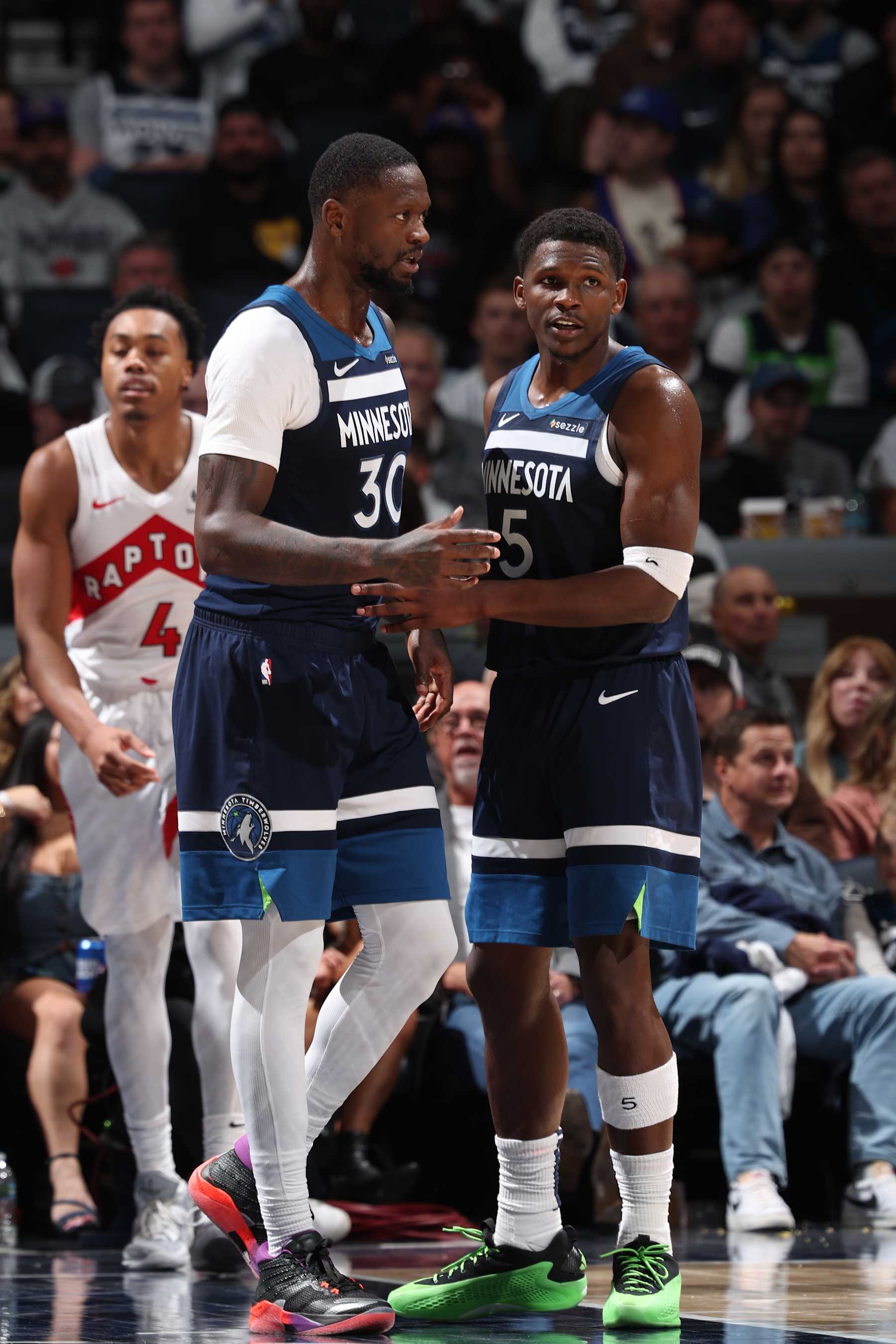 MINNEAPOLIS, MN -  OCTOBER 26: Julius Randle #30 and Anthony Edwards #5 of the Minnesota Timberwolves talk during the game against the Toronto Raptors on October 26, 2024 at Target Center in Minneapolis, Minnesota. NOTE TO USER: User expressly acknowledges and agrees that, by downloading and or using this Photograph, user is consenting to the terms and conditions of the Getty Images License Agreement. Mandatory Copyright Notice: Copyright 2024 NBAE (Photo by David Sherman/NBAE via Getty Images)