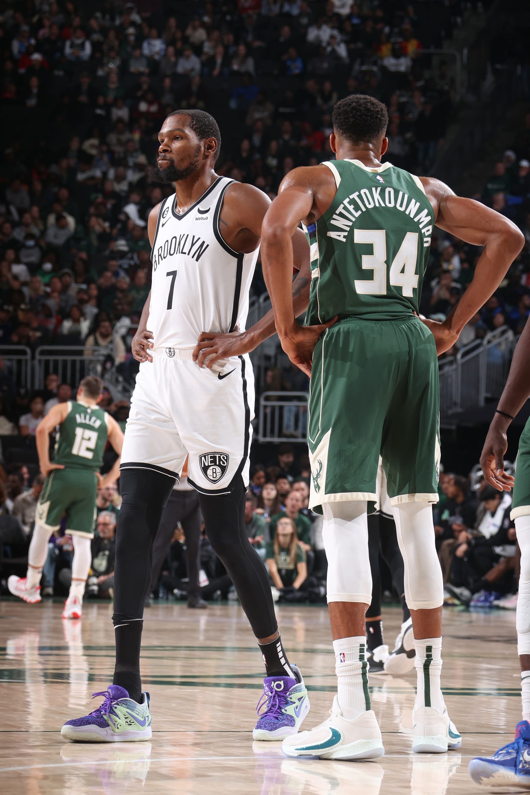 MILWAUKEE, WI - OCTOBER 26: Kevin Durant #7 of the Brooklyn Nets and Giannis Antetokounmpo #34 of the Milwaukee Bucks stand on the court on October 26, 2022 at the Fiserv Forum in Milwaukee, Wisconsin. NOTE TO USER: User expressly acknowledges and agrees that, by downloading and or using this Photograph, user is consenting to the terms and conditions of the Getty Images License Agreement. Mandatory Copyright Notice: Copyright 2022 NBAE (Photo by Nathaniel S. Butler/NBAE via Getty Images).