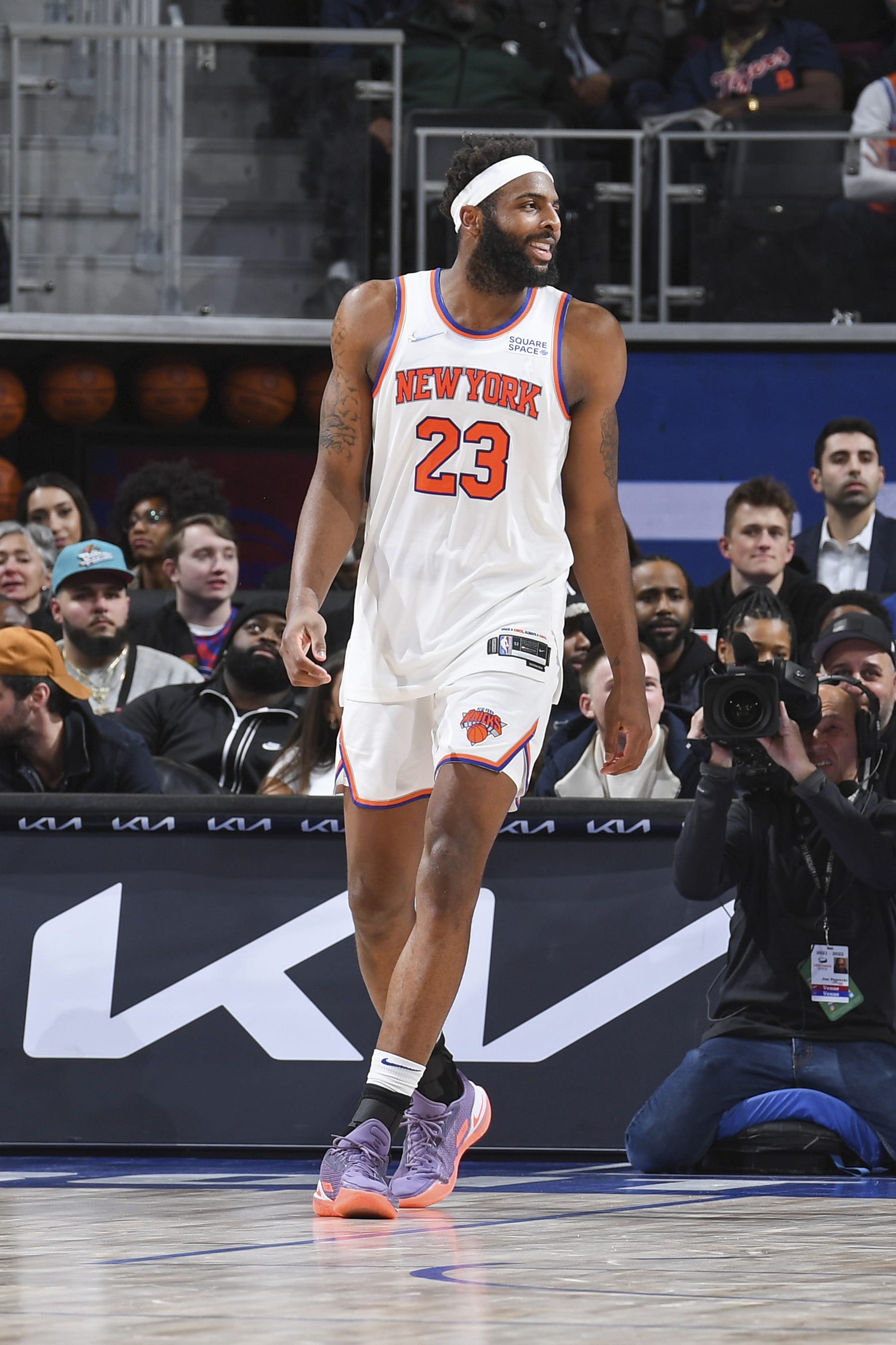 DETROIT, MI - MARCH 27: Mitchell Robinson #23 of the New York Knicks smiles during the game against the Detroit Pistons on March 27, 2022 at Little Caesars Arena in Detroit, Michigan. NOTE TO USER: User expressly acknowledges and agrees that, by downloading and/or using this photograph, User is consenting to the terms and conditions of the Getty Images License Agreement. Mandatory Copyright Notice: Copyright 2022 NBAE (Photo by Chris Schwegler/NBAE via Getty Images)