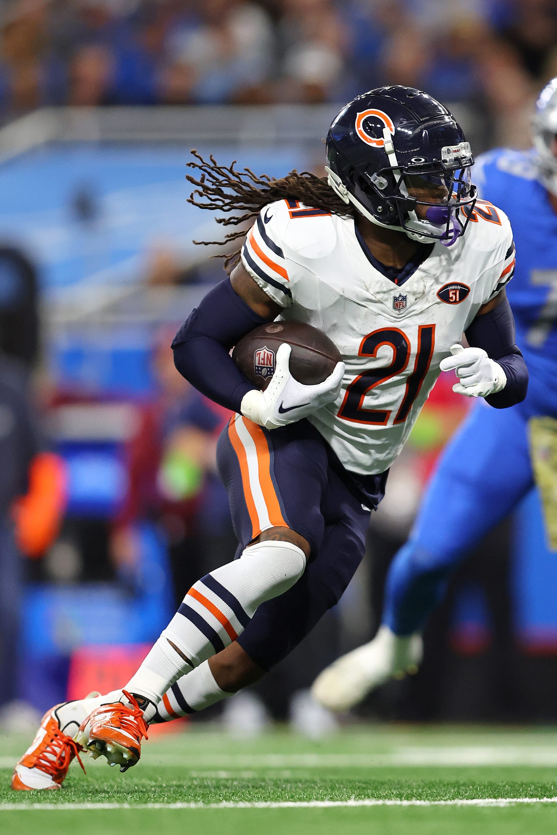 DETROIT, MICHIGAN - NOVEMBER 19: D'Onta Foreman #21 of the Chicago Bears runs with the ball during the first quarter of a game against the Detroit Lions at Ford Field on November 19, 2023 in Detroit, Michigan. (Photo by Rey Del Rio/Getty Images)