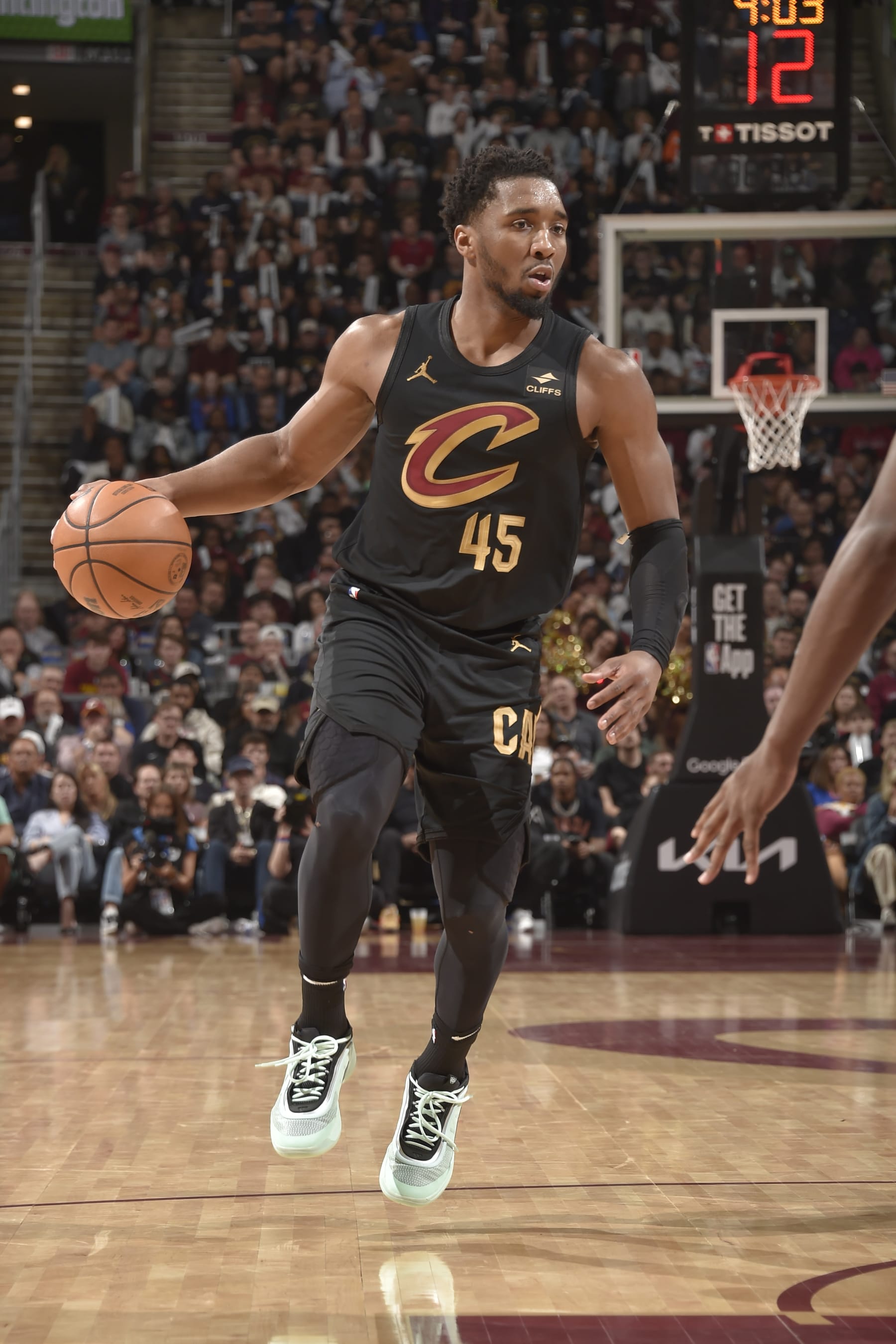 CLEVELAND, OH - APRIL 30: Donovan Mitchell #45 of the Cleveland Cavaliers handles the ball during the game against the Orlando Magic during Round 1 Game 5 of the 2024 NBA Playoffs on April 30, 2024 at Rocket Mortgage FieldHouse in Cleveland, Ohio. NOTE TO USER: User expressly acknowledges and agrees that, by downloading and/or using this Photograph, user is consenting to the terms and conditions of the Getty Images License Agreement. Mandatory Copyright Notice: Copyright 2024 NBAE (Photo by David Liam Kyle/NBAE via Getty Images)