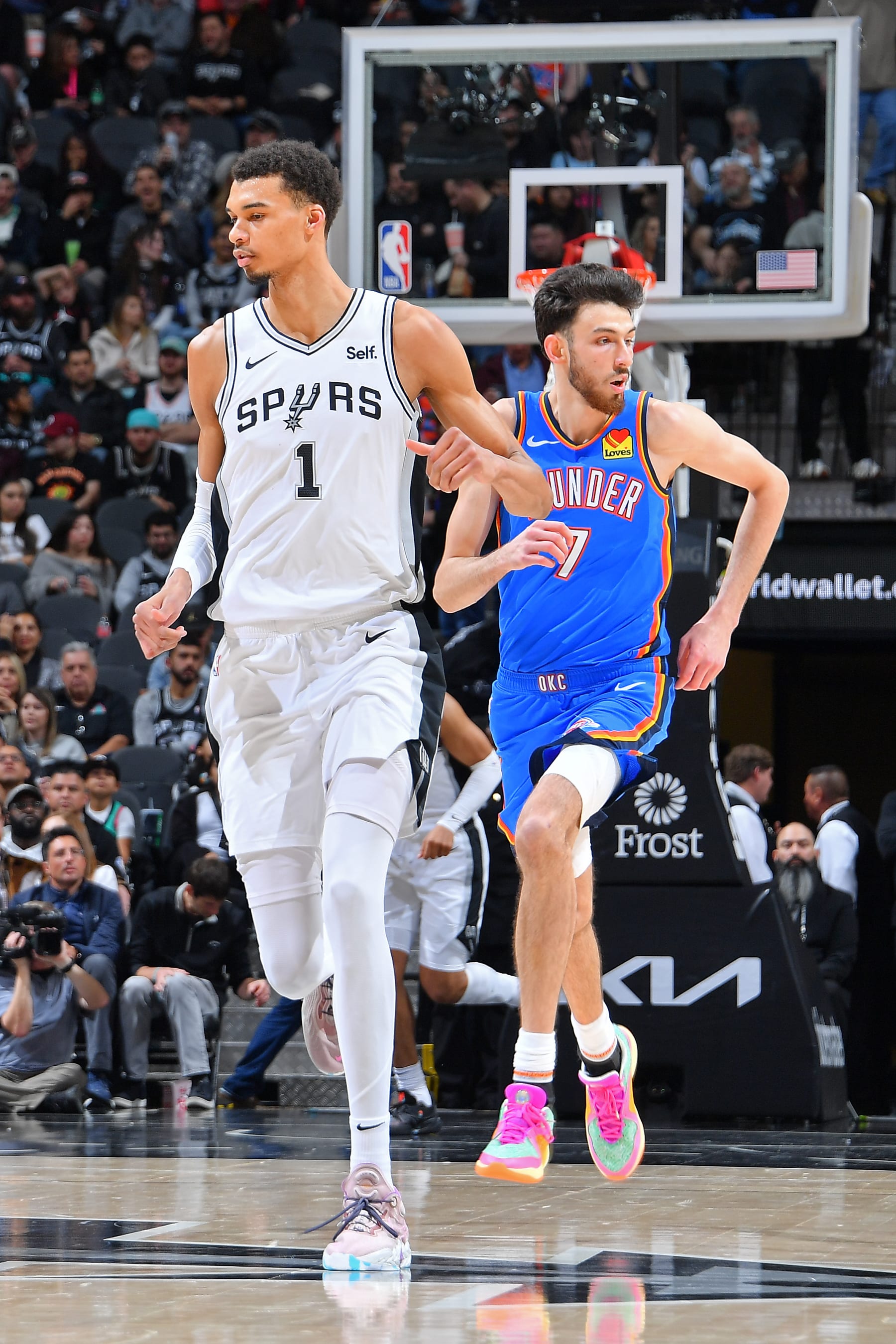 SAN ANTONIO, TX - FEBRUARY 29:Victor Wembanyama #1 of the San Antonio Spurs and Chet Holmgren #7 of the Oklahoma City Thunder look on during the game  on February 29, 2024 at the Frost Bank Center in San Antonio, Texas. NOTE TO USER: User expressly acknowledges and agrees that, by downloading and or using this photograph, user is consenting to the terms and conditions of the Getty Images License Agreement. Mandatory Copyright Notice: Copyright 2024 NBAE (Photos by Michael Gonzales/NBAE via Getty Images)