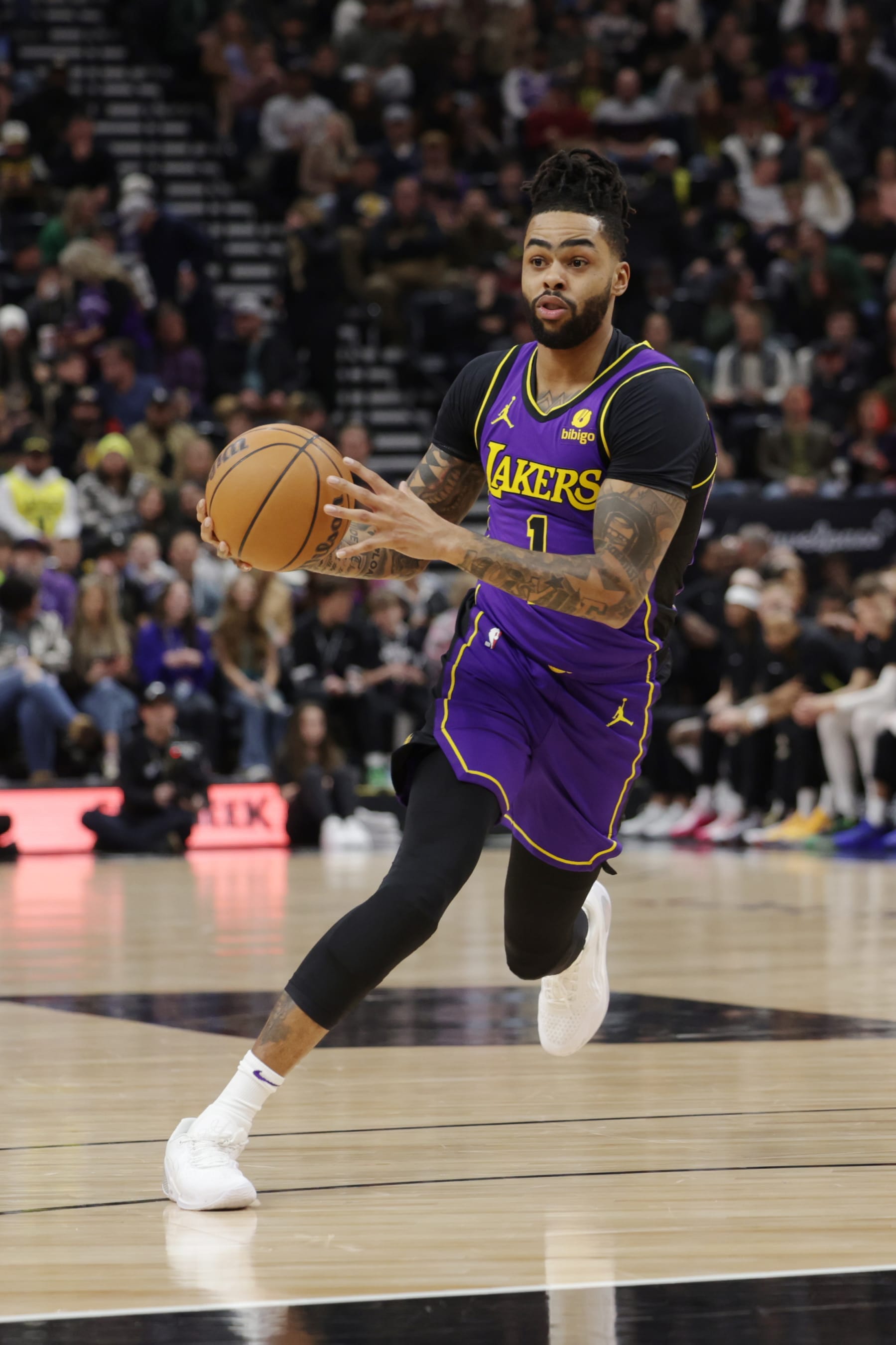 SALT LAKE CITY, UT - JANUARY 13:  D'Angelo Russell #1 of the Los Angeles Lakers looks to pass the ball during the game against the Utah Jazz on January 13, 2024 at vivint.SmartHome Arena in Salt Lake City, Utah. NOTE TO USER: User expressly acknowledges and agrees that, by downloading and or using this Photograph, User is consenting to the terms and conditions of the Getty Images License Agreement. Mandatory Copyright Notice: Copyright 2024 NBAE (Photo by Chris Nicoll/NBAE via Getty Images)