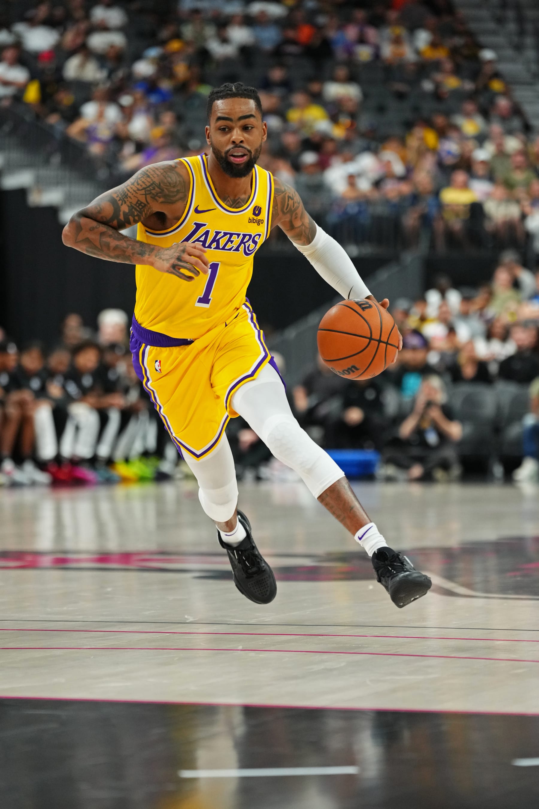 LAS VEGAS, NV - OCTOBER 9: D'Angelo Russell #1 of the Los Angeles Lakers drives to the basket during the game against the Brooklyn Nets on October 9, 2023 at T-Mobile Arena in Las Vegas, Nevada. NOTE TO USER: User expressly acknowledges and agrees that, by downloading and or using this photograph, User is consenting to the terms and conditions of the Getty Images License Agreement. Mandatory Copyright Notice: Copyright 2023 NBAE (Photo by Jeff Bottari/NBAE via Getty Images)