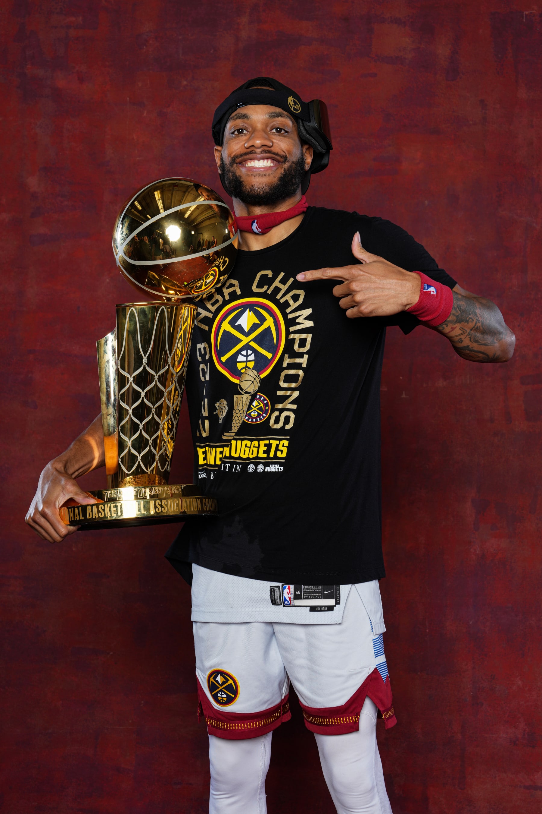 DENVER, CO - JUNE 12: Bruce Brown #11 of the Denver Nuggets poses for a portrait with the Larry O'Brien Trophy after winning Game Five of the 2023 NBA Finals on June 12, 2023 at Ball Arena in Denver, Colorado. NOTE TO USER: User expressly acknowledges and agrees that, by downloading and or using this Photograph, user is consenting to the terms and conditions of the Getty Images License Agreement. Mandatory Copyright Notice: Copyright 2023 NBAE (Photo by Jesse D. Garrabrant/NBAE via Getty Images)