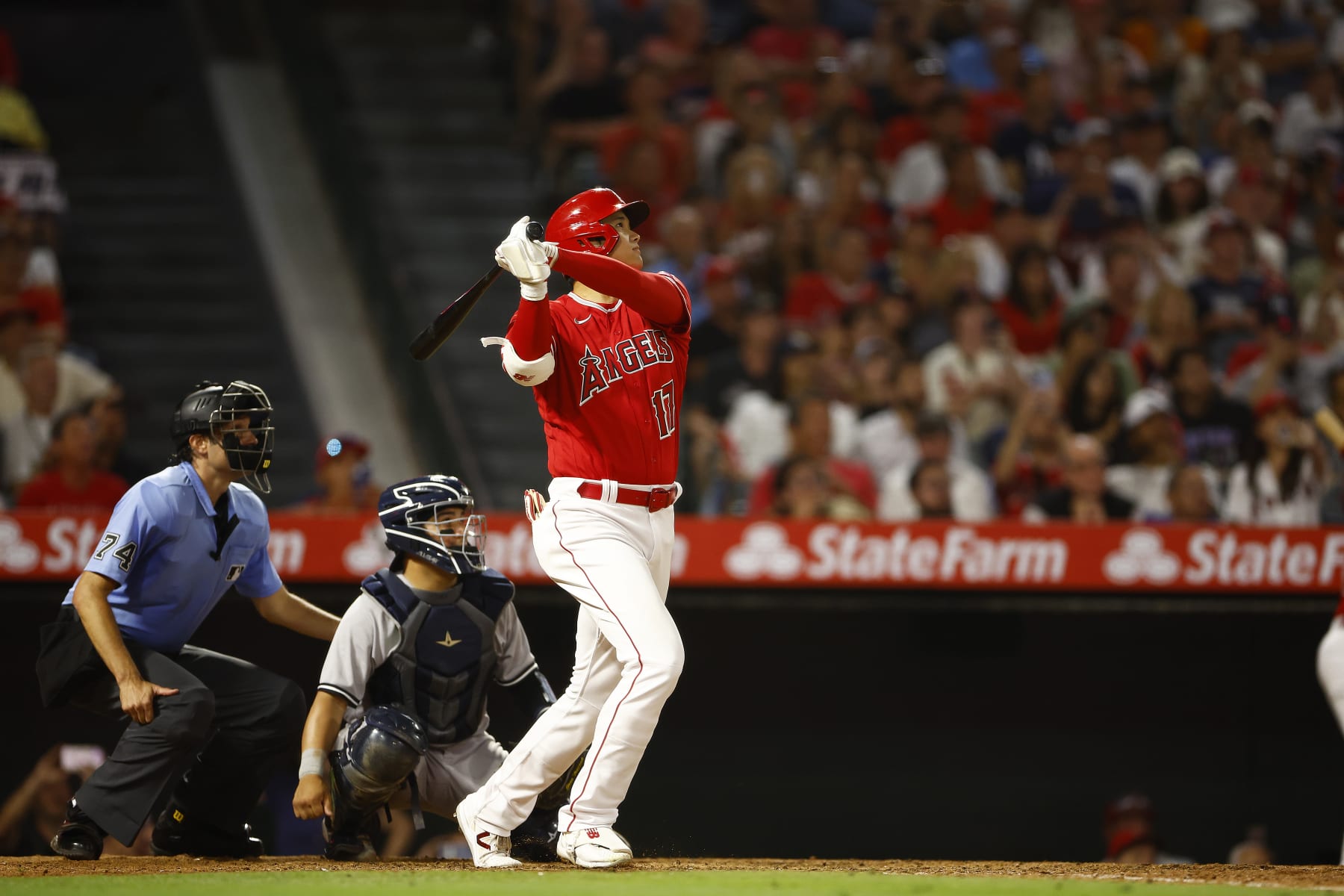 ANAHEIM, CALIFORNIA - JULY 17:  Shohei Ohtani #17 of the Los Angeles Angels reacts after hitting a two-run home run against the New York Yankees in the seventh inning at Angel Stadium of Anaheim on July 17, 2023 in Anaheim, California. (Photo by Ronald Martinez/Getty Images)