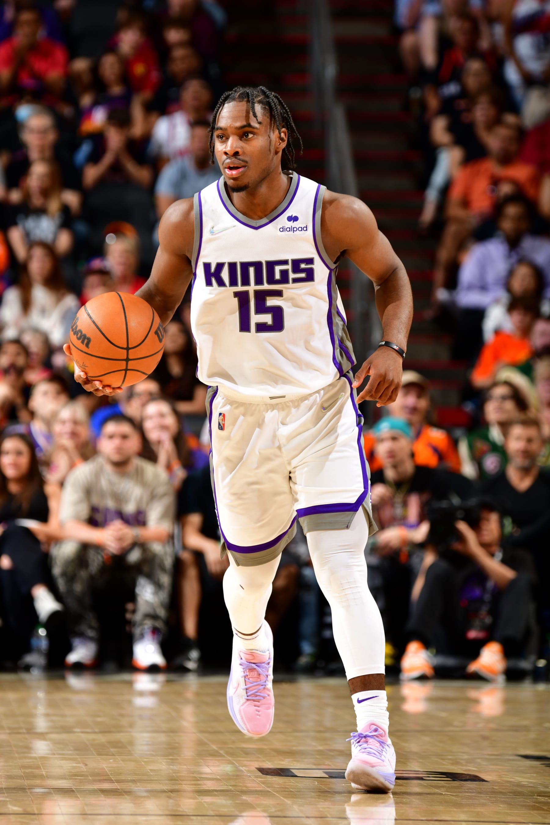 PHOENIX, AZ - APRIL 10: Davion Mitchell #15 of the Sacramento Kings dribbles the ball during the game against the Phoenix Suns on April 10, 2022 at Footprint Center in Phoenix, Arizona. NOTE TO USER: User expressly acknowledges and agrees that, by downloading and or using this photograph, user is consenting to the terms and conditions of the Getty Images License Agreement. Mandatory Copyright Notice: Copyright 2022 NBAE (Photo by Barry Gossage/NBAE via Getty Images)