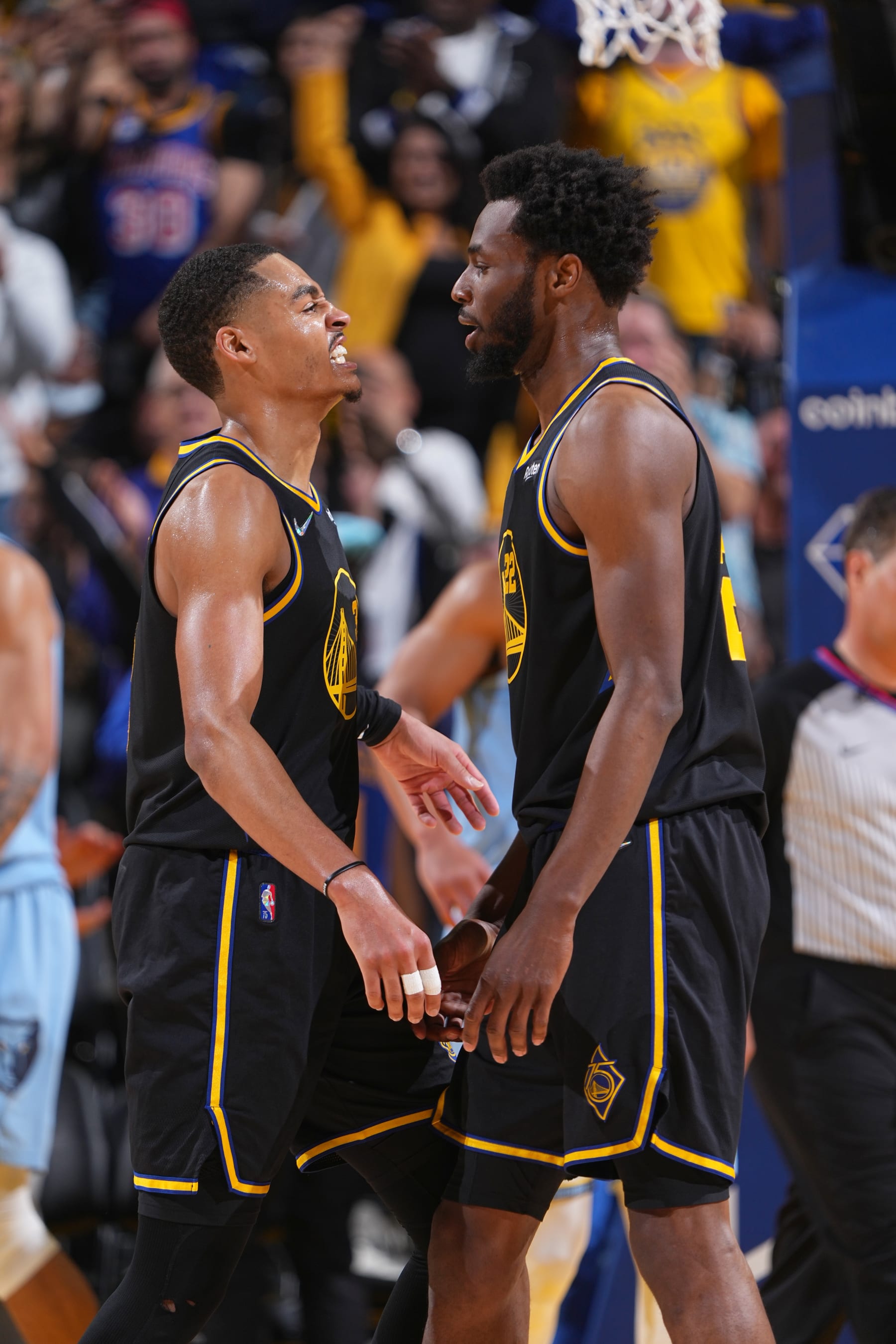 SAN FRANCISCO, CA - MAY 7: Jordan Poole #3 of the Golden State Warriors and Andrew Wiggins #22 celebrate during Game 3 of the 2022 NBA Playoffs Western Conference Semifinals on May 7, 2022 at Chase Center in San Francisco, California. NOTE TO USER: User expressly acknowledges and agrees that, by downloading and or using this photograph, user is consenting to the terms and conditions of Getty Images License Agreement. Mandatory Copyright Notice: Copyright 2022 NBAE (Photo by Garrett Ellwood/NBAE via Getty Images)