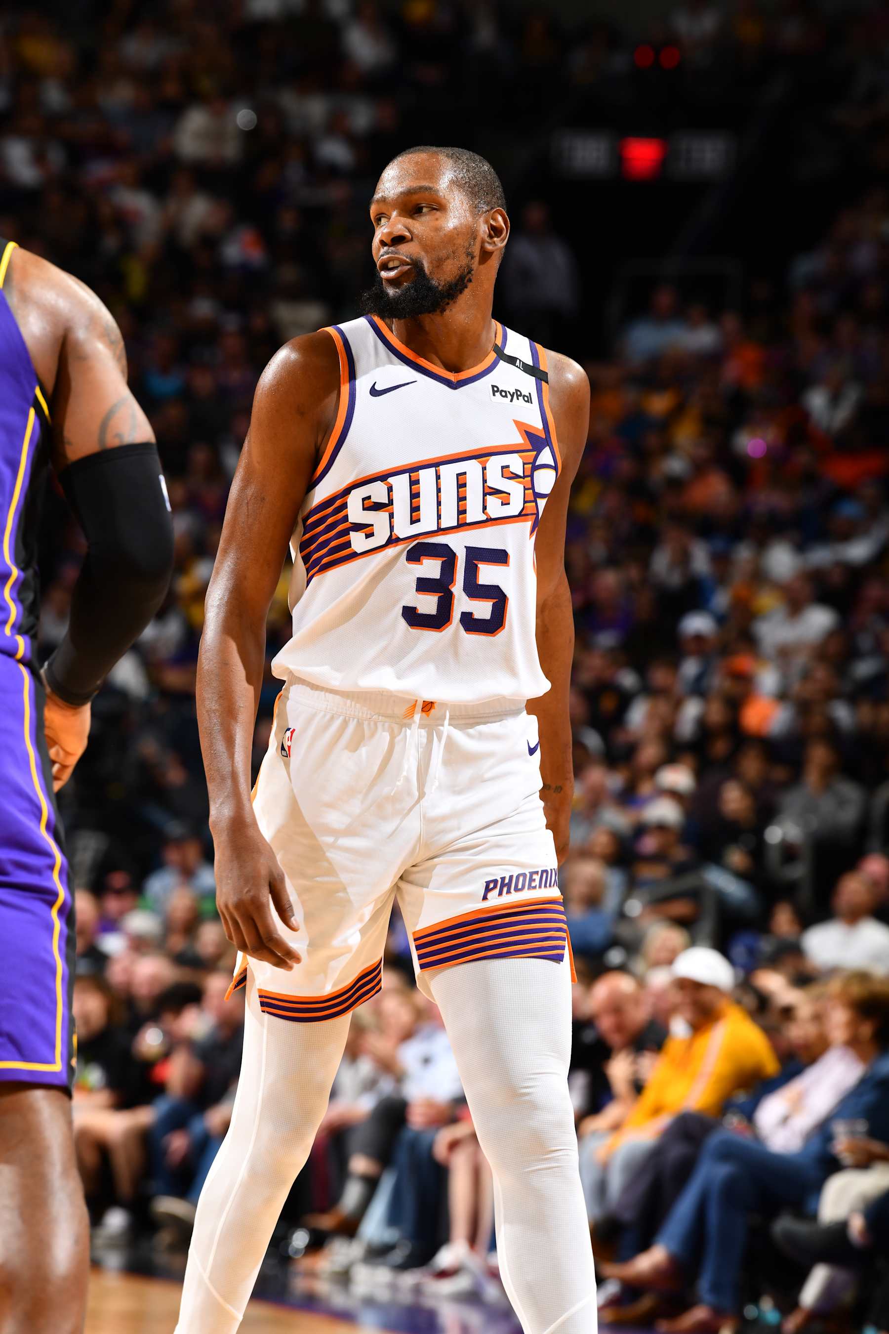 PHOENIX, AZ - OCTOBER 28: Kevin Durant #35 of the Phoenix Suns looks on during the game against the Los Angeles Lakers on October 28, 2024 at Footprint Center in Phoenix, Arizona. NOTE TO USER: User expressly acknowledges and agrees that, by downloading and or using this photograph, user is consenting to the terms and conditions of the Getty Images License Agreement. Mandatory Copyright Notice: Copyright 2024 NBAE (Photo by Barry Gossage/NBAE via Getty Images)