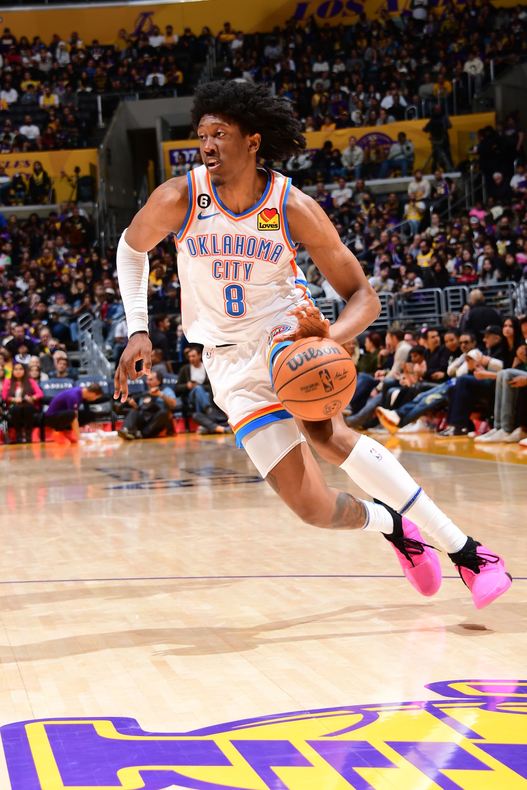 LOS ANGELES, CA - MARCH 24:  Jalen Williams #8 of the Oklahoma City Thunder goes to the basket during the game on March 24, 2023 at Crypto.Com Arena in Los Angeles, California. NOTE TO USER: User expressly acknowledges and agrees that, by downloading and/or using this Photograph, user is consenting to the terms and conditions of the Getty Images License Agreement. Mandatory Copyright Notice: Copyright 2023 NBAE (Photo by Adam Pantozzi/NBAE via Getty Images)