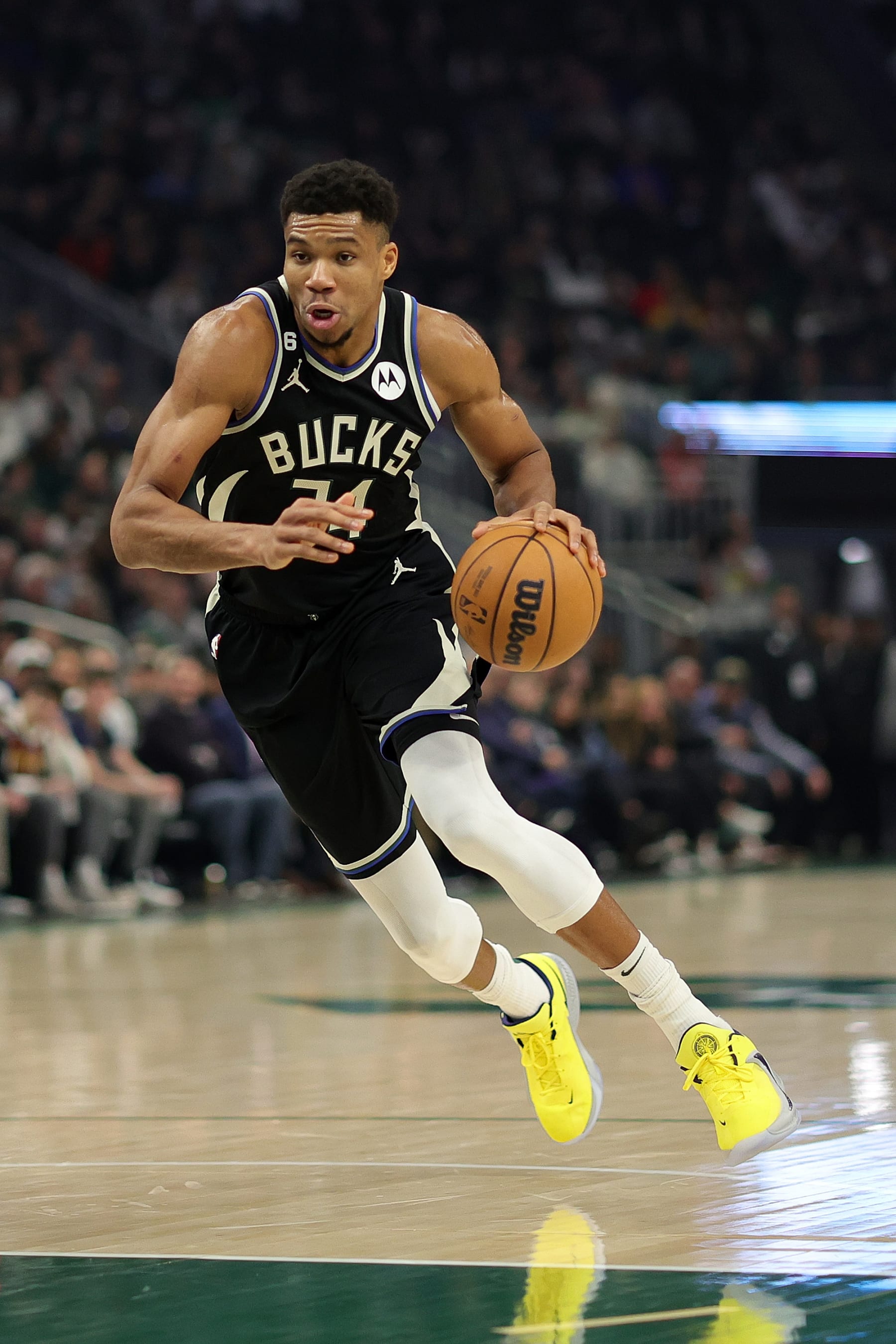 MILWAUKEE, WISCONSIN - DECEMBER 13: Giannis Antetokounmpo #34 of the Milwaukee Bucks handles the ball during a game against the Golden State Warriors at Fiserv Forum on December 13, 2022 in Milwaukee, Wisconsin. The Bucks defeated the Warriors 128-111. NOTE TO USER: User expressly acknowledges and agrees that, by downloading and or using this photograph, User is consenting to the terms and conditions of the Getty Images License Agreement. (Photo by Stacy Revere/Getty Images)