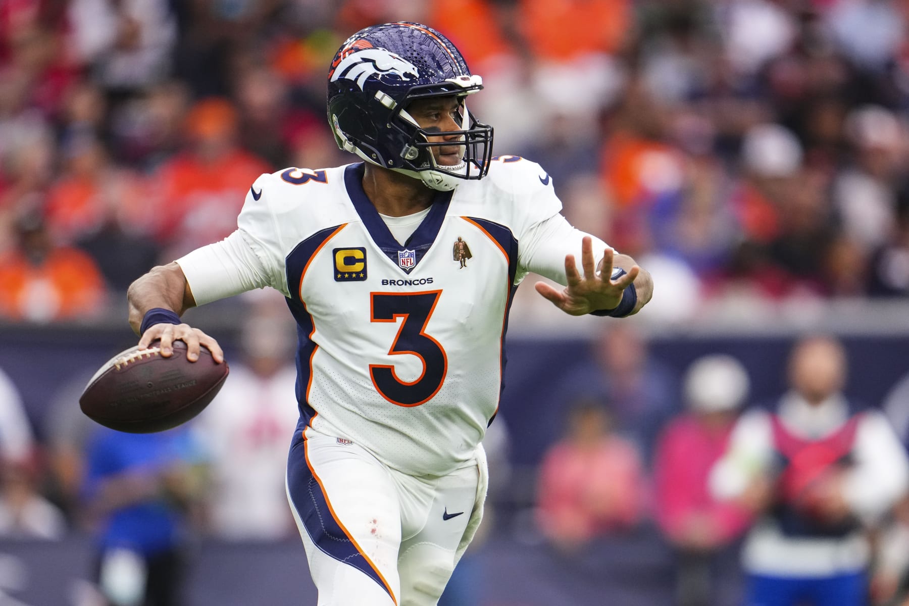HOUSTON, TX - DECEMBER 03: Russell Wilson #3 of the Denver Broncos throws the ball during an NFL football game against the Houston Texans at NRG Stadium on December 3, 2023 in Houston, Texas. (Photo by Cooper Neill/Getty Images)
