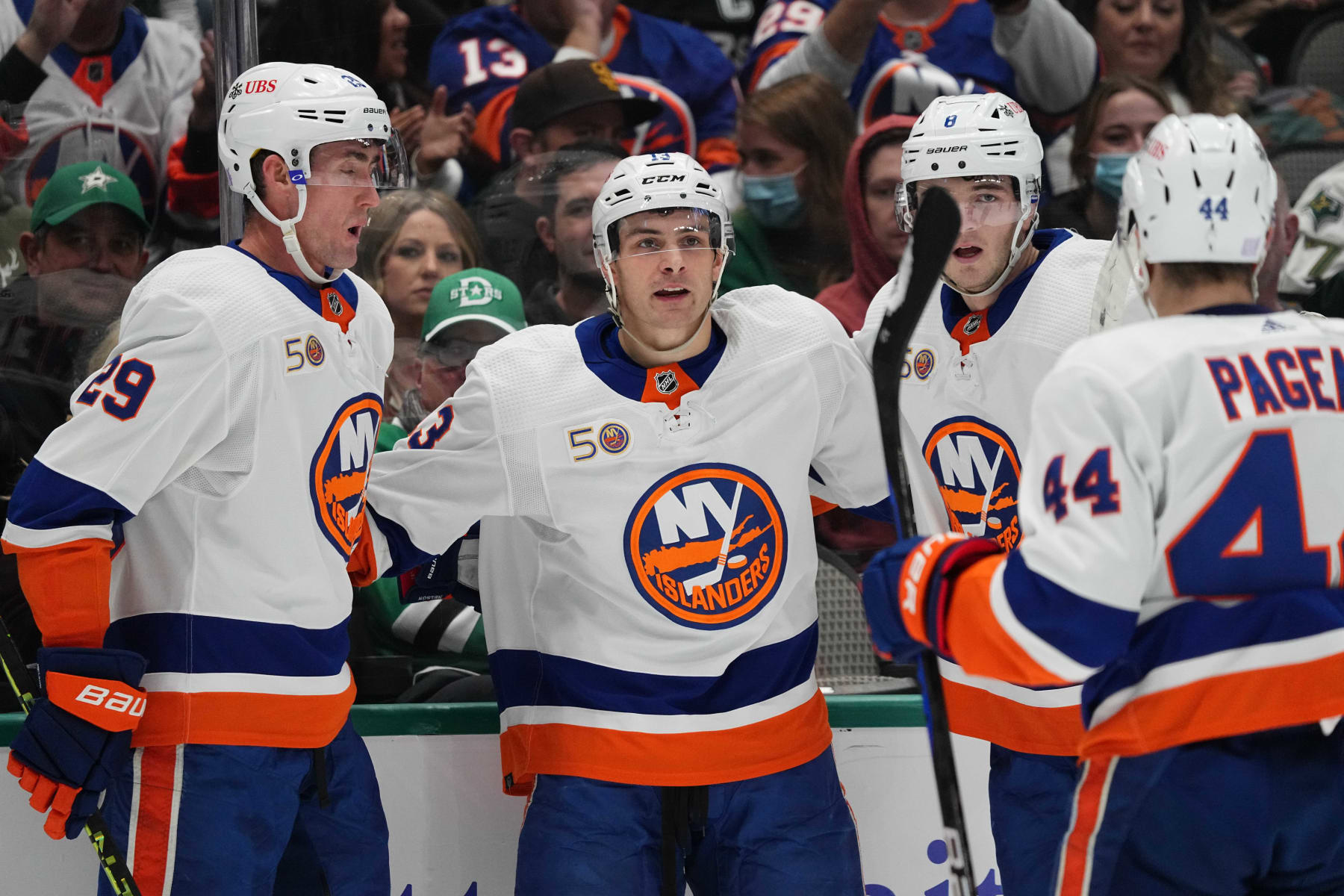 DALLAS, TX - NOVEMBER 19: Brock Nelson #29, Mathew Barzal #13, Noah Dobson #8 and Jean-Gabriel Pageau #44 of the New York Islanders celebrate a goal against the Dallas Stars at the American Airlines Center on November 19, 2022 in Dallas, Texas. (Photo by Glenn James/NHLI via Getty Images)