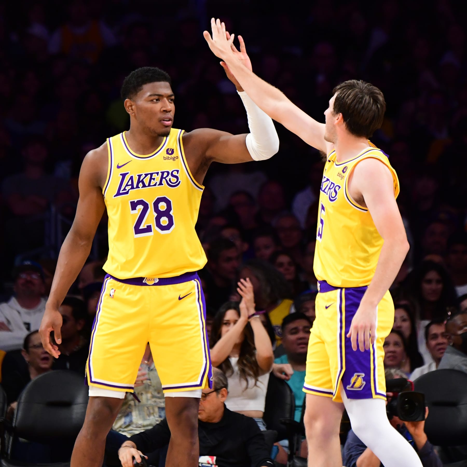LOS ANGELES, CA - OCTOBER 13: Rui Hachimura #28 of the Los Angeles Lakers high fives Austin Reaves #15 of the Los Angeles Lakers during the game against the Golden State Warriors on October 13, 2023 at Crypto.Com Arena in Los Angeles, California. NOTE TO USER: User expressly acknowledges and agrees that, by downloading and/or using this Photograph, user is consenting to the terms and conditions of the Getty Images License Agreement. Mandatory Copyright Notice: Copyright 2023 NBAE (Photo by Adam Pantozzi/NBAE via Getty Images)