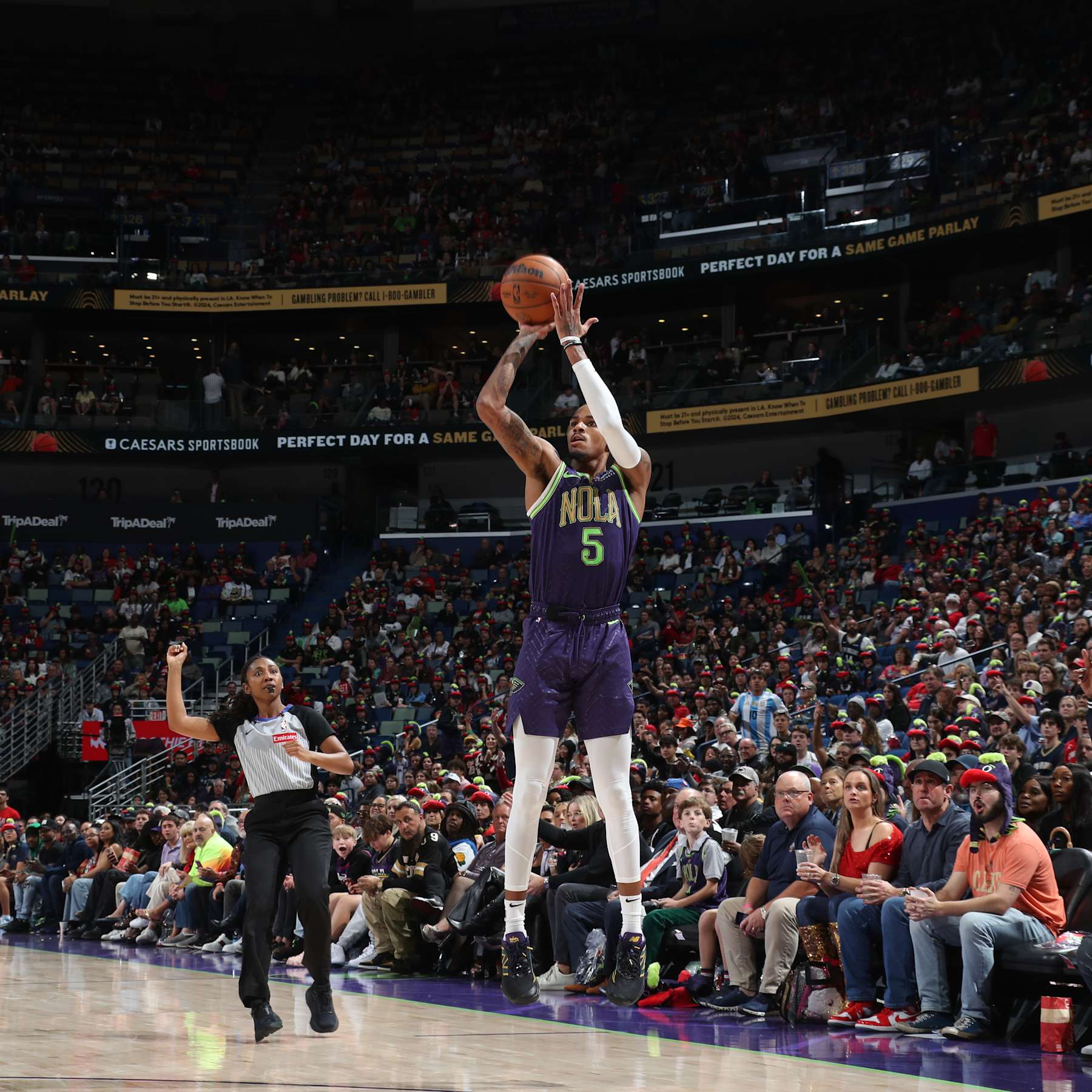 NEW ORLEANS, LA - NOVEMBER 27:   Dejounte Murray #5 of the New Orleans Pelicans shoots the ball during the game against the Toronto Raptors during a regular season game on November 27, 2024 at the Smoothie King Center in New Orleans, Louisiana. NOTE TO USER: User expressly acknowledges and agrees that, by downloading and or using this Photograph, user is consenting to the terms and conditions of the Getty Images License Agreement. Mandatory Copyright Notice: Copyright 2024 NBAE (Photo by Layne Murdoch Jr./NBAE via Getty Images)
