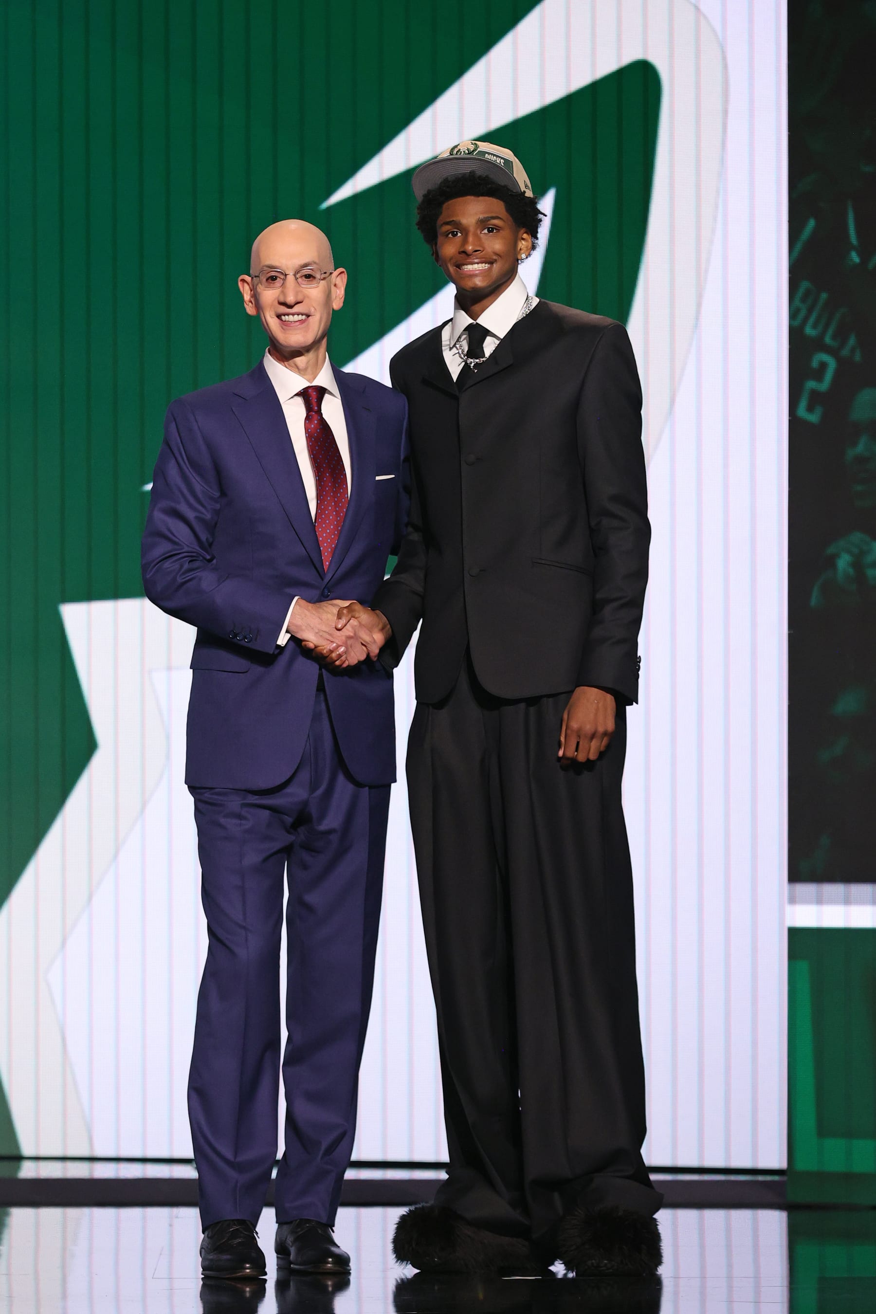 BROOKLYN, NY - JUNE 26: NBA Commissioner, Adam Silver poses for a photo with AJ Johnson after being drafted twenty-third overall by the Milwaukee Bucks during the 2024 NBA Draft - Round One on June 26, 2024 at Barclays Center in Brooklyn, New York. NOTE TO USER: User expressly acknowledges and agrees that, by downloading and or using this photograph, User is consenting to the terms and conditions of the Getty Images License Agreement. Mandatory Copyright Notice: Copyright 2024 NBAE (Photo by Nathaniel S. Butler/NBAE via Getty Images)