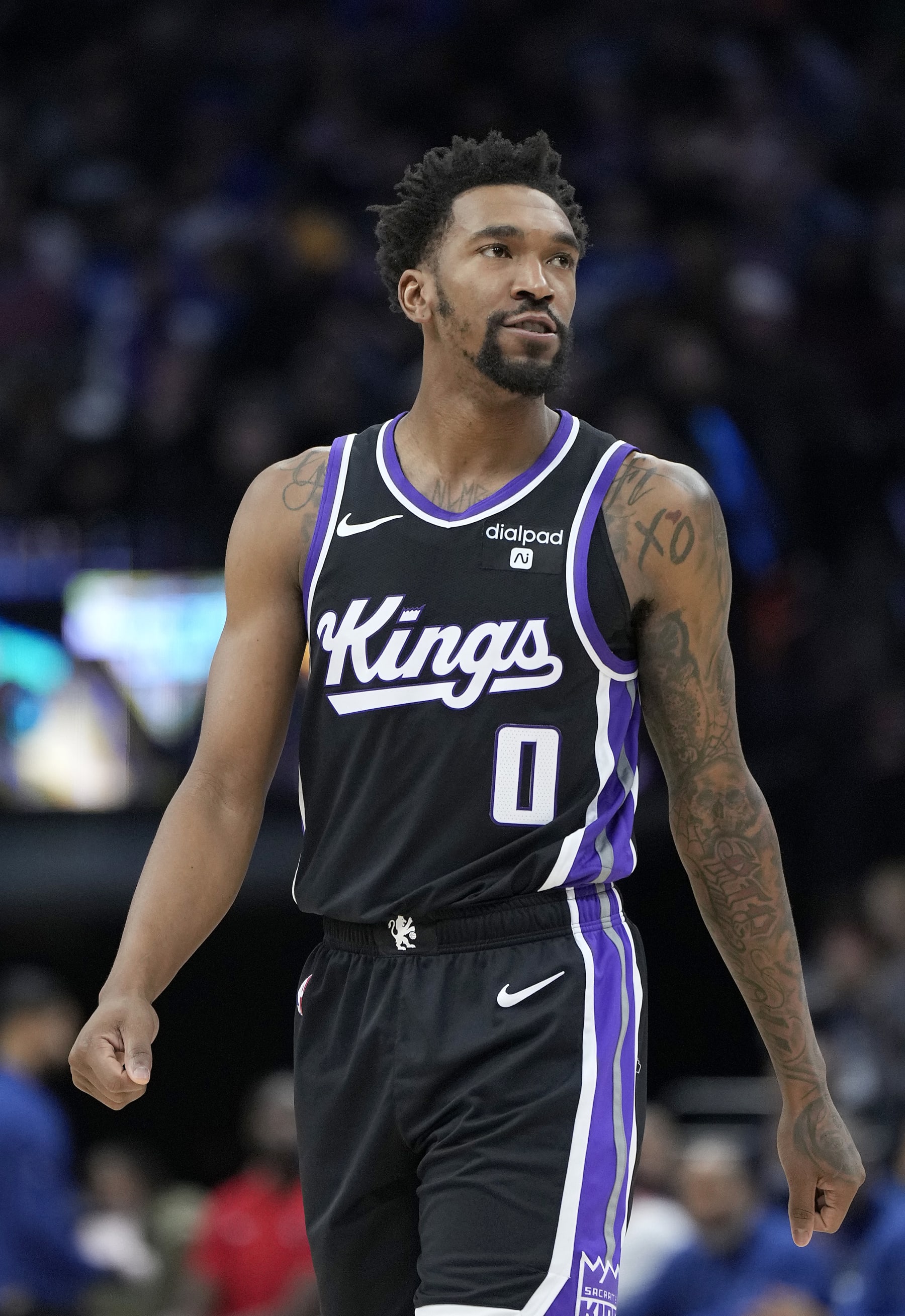 SACRAMENTO, CALIFORNIA - DECEMBER 18: Malik Monk #0 of the Sacramento Kings looks on against the Washington Wizards during the second half of an NBA basketball game at Golden 1 Center on December 18, 2023 in Sacramento, California. NOTE TO USER: User expressly acknowledges and agrees that, by downloading and or using this photograph, User is consenting to the terms and conditions of the Getty Images License Agreement. (Photo by Thearon W. Henderson/Getty Images)