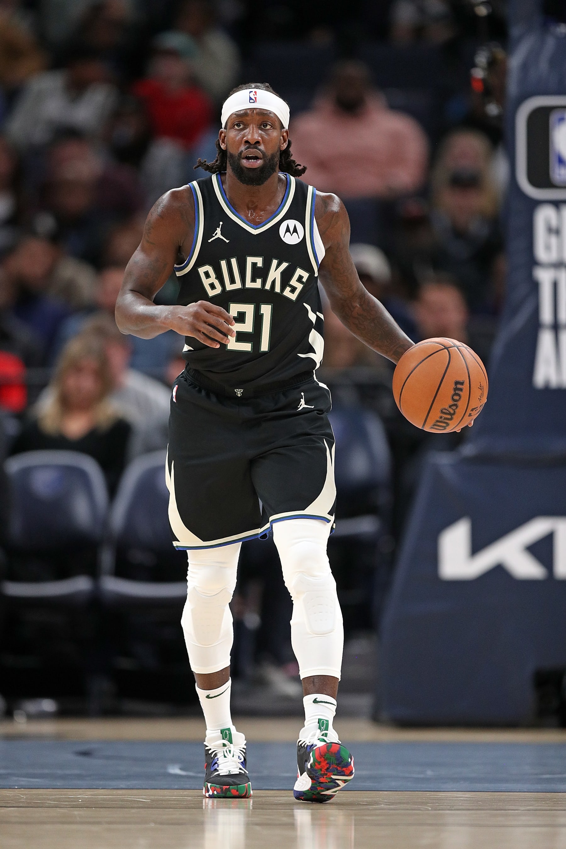 MEMPHIS, TENNESSEE - FEBRUARY 15: Patrick Beverley #21 of the Milwaukee Bucks brings the ball up court during the game against the Memphis Grizzlies at FedExForum on February 15, 2024 in Memphis, Tennessee. NOTE TO USER: User expressly acknowledges and agrees that, by downloading and or using this photograph, User is consenting to the terms and conditions of the Getty Images License Agreement. (Photo by Justin Ford/Getty Images)