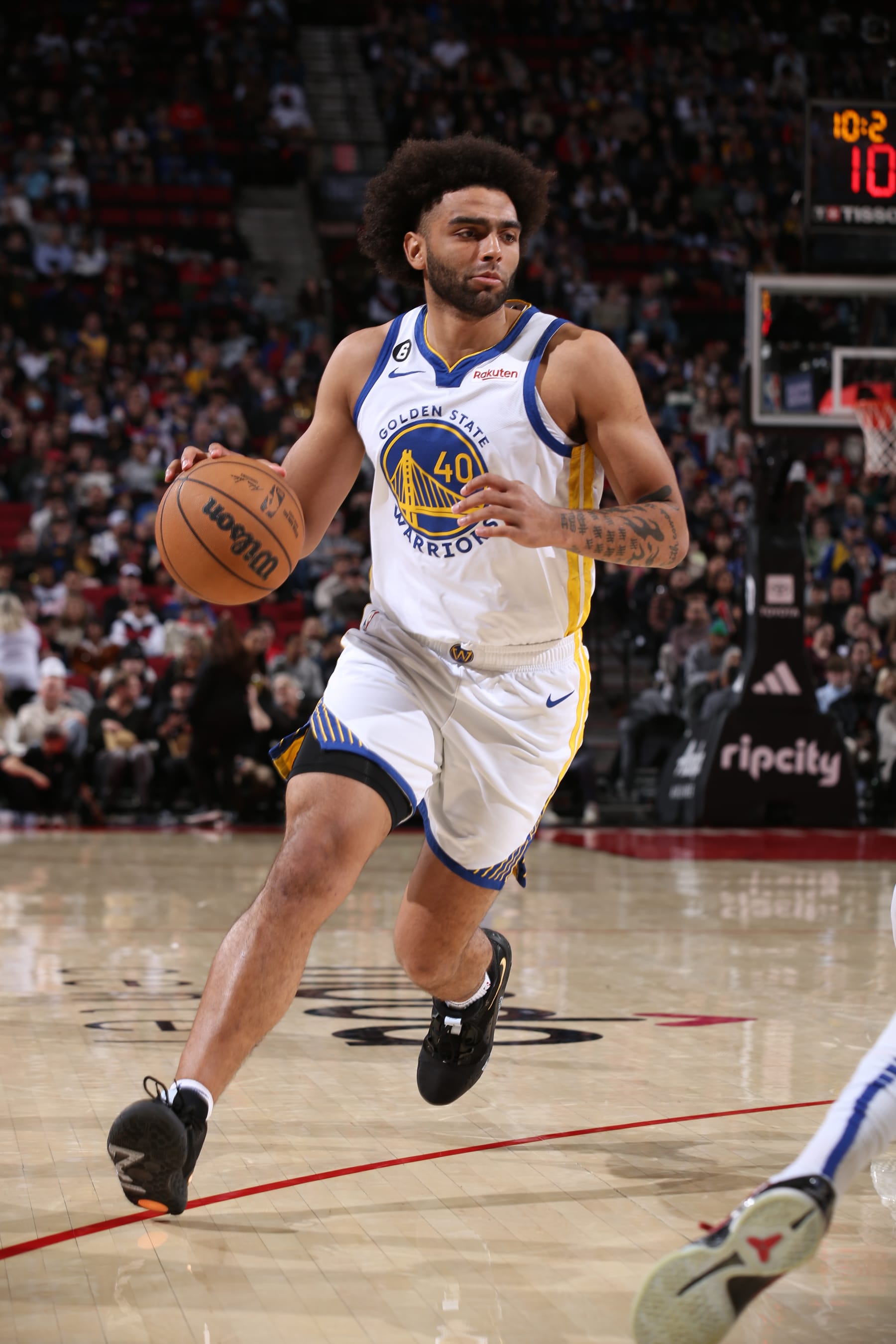PORTLAND, OR - APRIL 9: Anthony Lamb #40 of the Golden State Warriors dribbles the ball during the game against the Portland Trail Blazers on April 9, 2023 at the Moda Center Arena in Portland, Oregon. NOTE TO USER: User expressly acknowledges and agrees that, by downloading and or using this photograph, user is consenting to the terms and conditions of the Getty Images License Agreement. Mandatory Copyright Notice: Copyright 2023 NBAE (Photo by Cameron Browne/NBAE via Getty Images)
