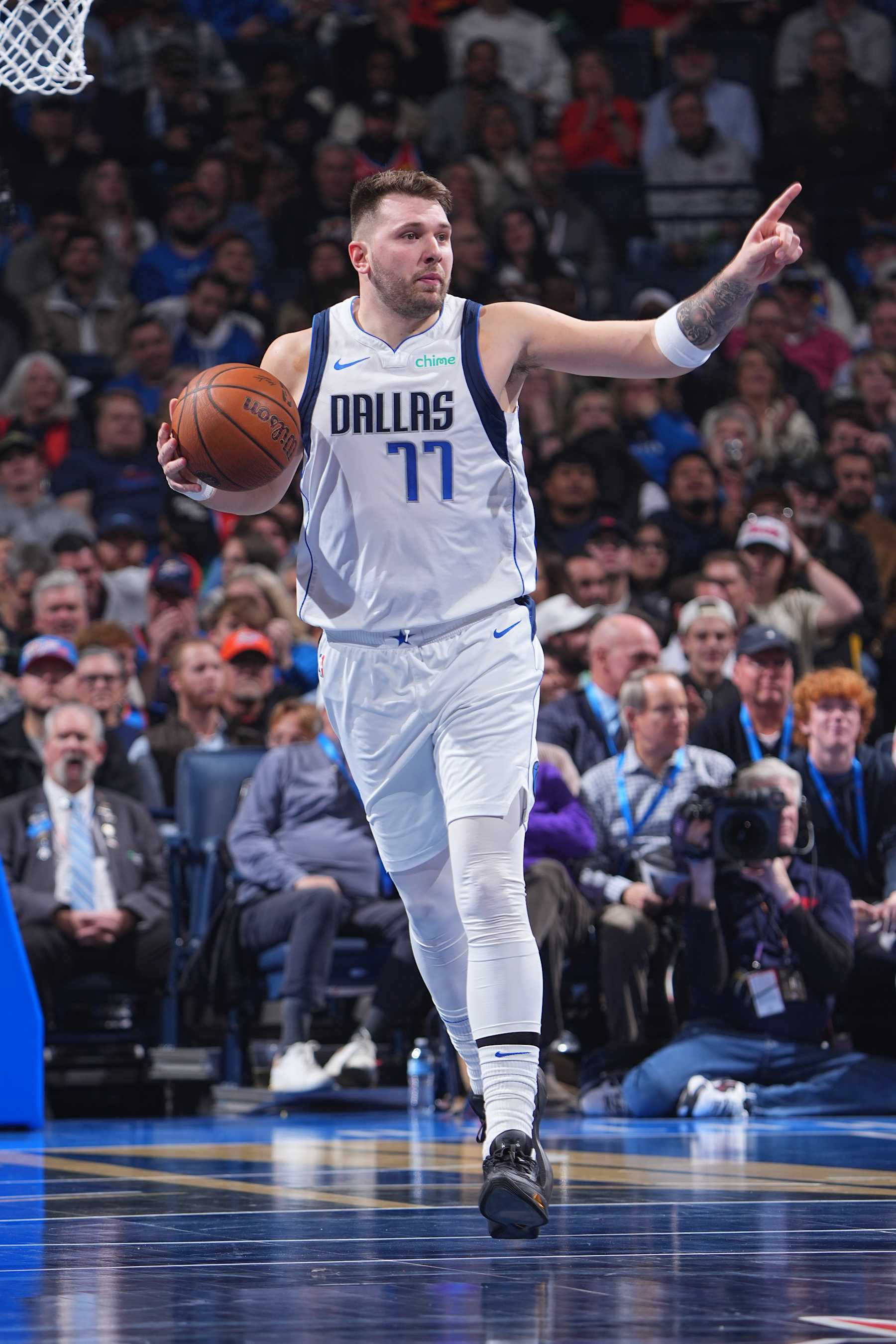 OKLAHOMA CITY, OK - DECEMBER 10: Luka Doncic #77 of the Dallas Mavericks dribbles the ball during the game against the Oklahoma City Thunder during the Emirates NBA Cup Quarterfinals on December 10, 2024 at Paycom Center in Oklahoma City, Oklahoma. NOTE TO USER: User expressly acknowledges and agrees that, by downloading and or using this photograph, User is consenting to the terms and conditions of the Getty Images License Agreement. Mandatory Copyright Notice: Copyright 2024 NBAE (Photo by Garrett Ellwood/NBAE via Getty Images)