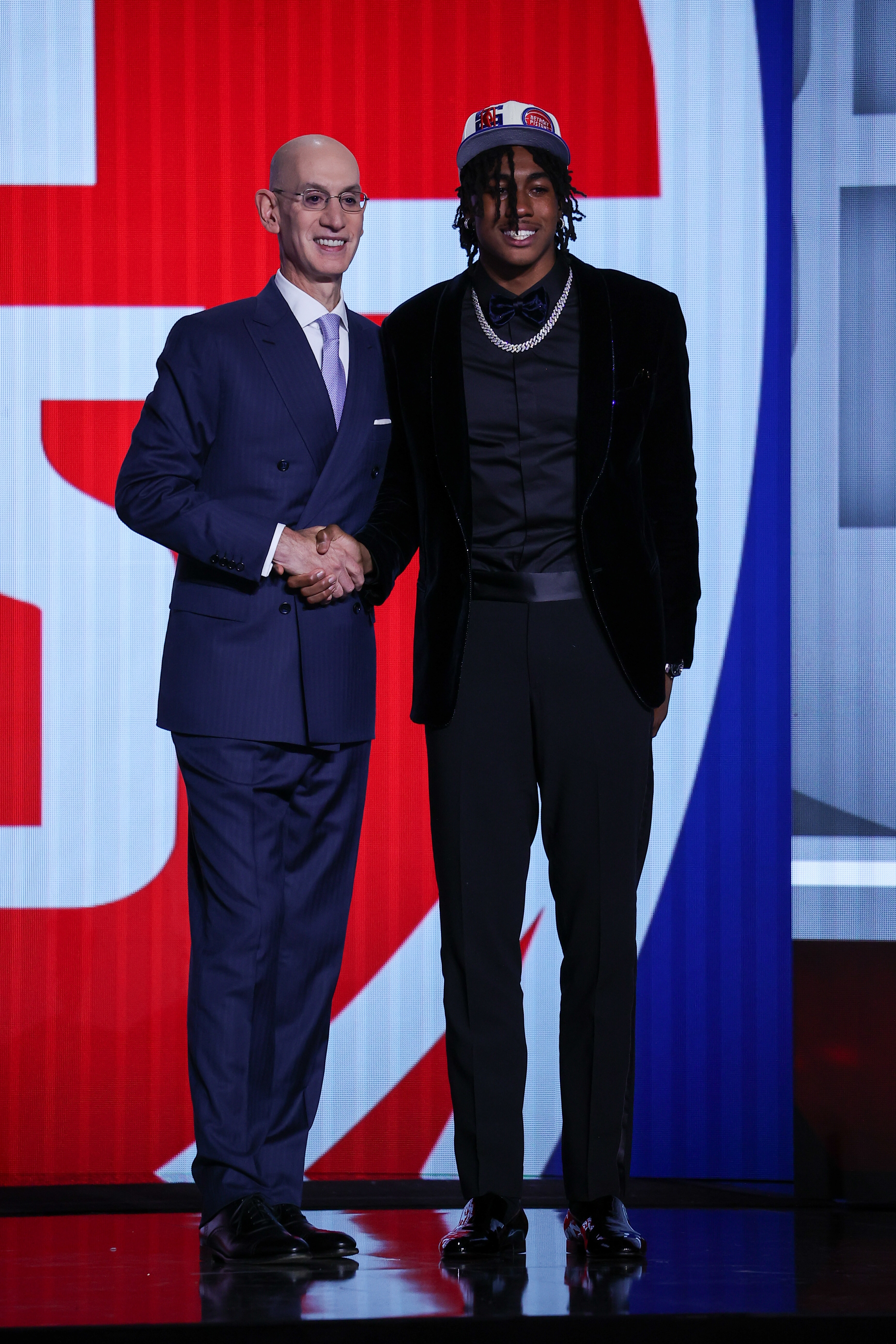 NEW YORK, NY, USA - JUNE 23: Jaden Ivey shakes hands with NBA Commissioner, Adam Silver (L) after being selected number five overall by the Detroit Pistons during the 2022 NBA Draft on June 23, 2022 at Barclays Center in Brooklyn, New York, United States. (Photo by Tayfun Coskun/Anadolu Agency via Getty Images)