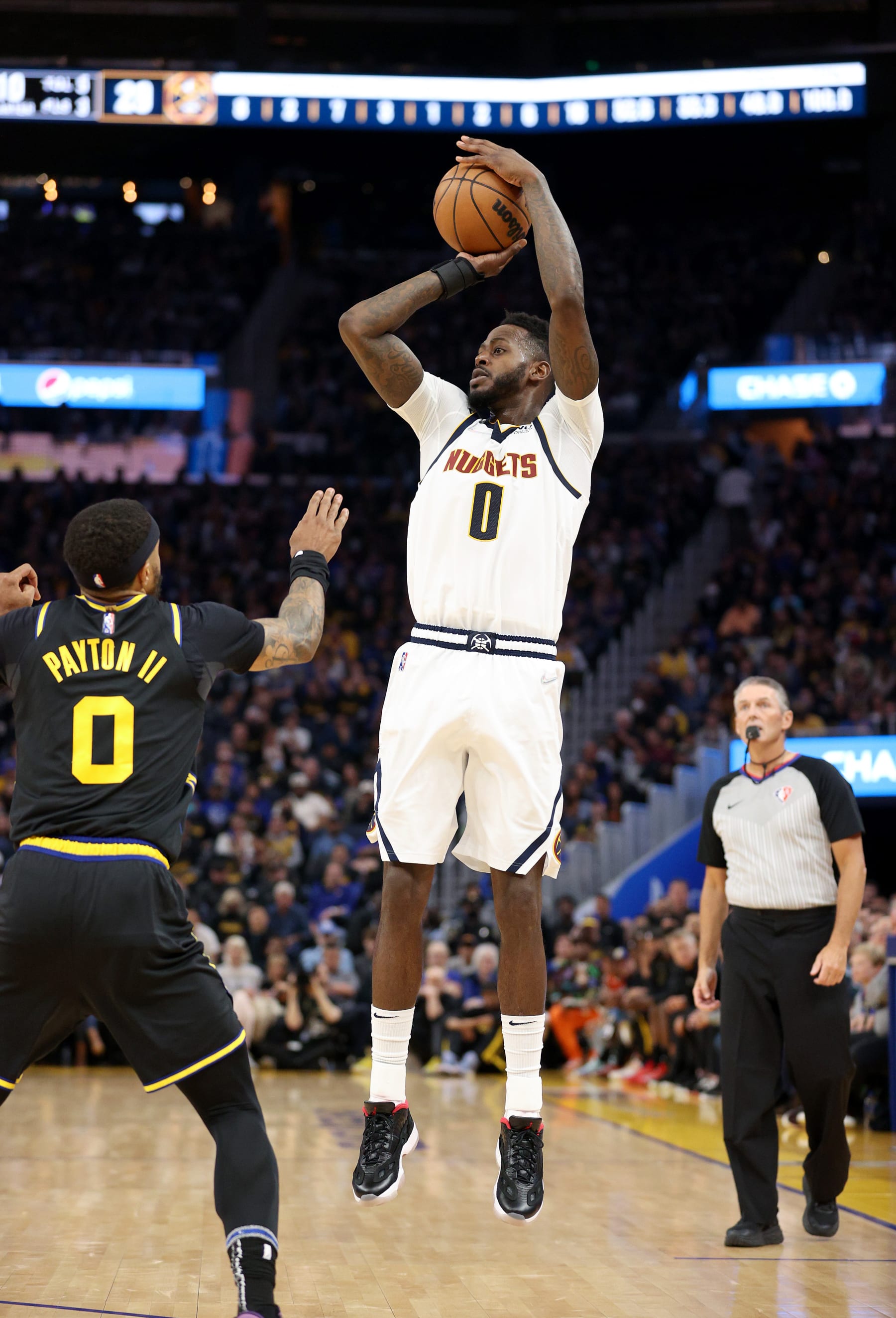 SAN FRANCISCO, CALIFORNIA - APRIL 16: JaMychal Green #0 of the Denver Nuggets in action against the Golden State Warriors during Game One of the Western Conference First Round NBA Playoffs at Chase Center on April 16, 2022 in San Francisco, California. NOTE TO USER: User expressly acknowledges and agrees that, by downloading and/or using this photograph, User is consenting to the terms and conditions of the Getty Images License Agreement.  (Photo by Ezra Shaw/Getty Images)