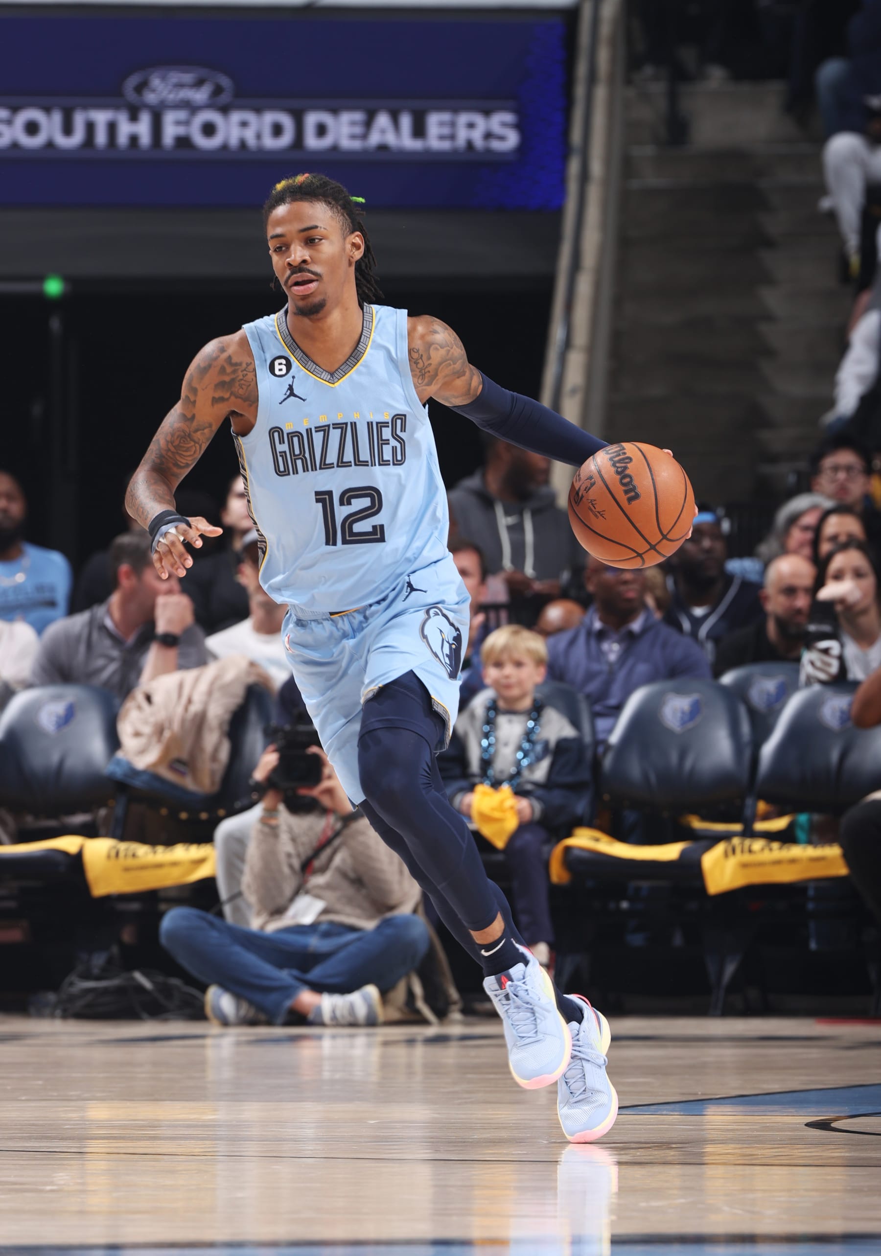 MEMPHIS, TN - APRIL 26: Ja Morant #12 of the Memphis Grizzlies dribbles the ball during Round 1 Game 5 of the 2023 NBA Playoffs against the Los Angeles Lakers on April 26, 2023 at FedExForum in Memphis, Tennessee. NOTE TO USER: User expressly acknowledges and agrees that, by downloading and or using this photograph, User is consenting to the terms and conditions of the Getty Images License Agreement. Mandatory Copyright Notice: Copyright 2023 NBAE (Photo by Joe Murphy/NBAE via Getty Images)