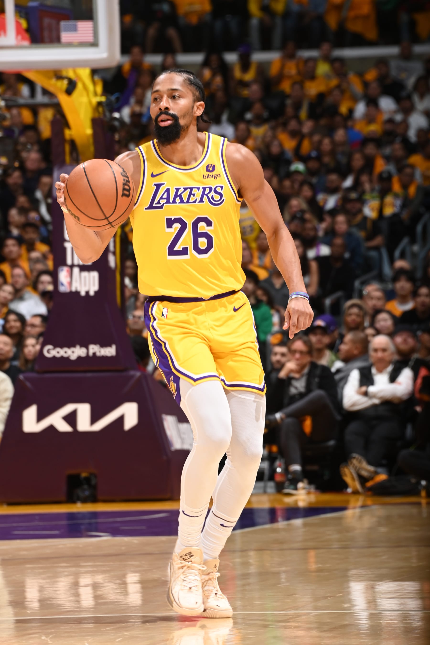 LOS ANGELES, CA - APRIL 25: Spencer Dinwiddie #26 of the Los Angeles Lakers dribbles the ball during the game against the Denver Nuggets during Round 1 Game 3 of the 2024 NBA Playoffs on April 25, 2024 at Crypto.Com Arena in Los Angeles, California. NOTE TO USER: User expressly acknowledges and agrees that, by downloading and/or using this Photograph, user is consenting to the terms and conditions of the Getty Images License Agreement. Mandatory Copyright Notice: Copyright 2024 NBAE (Photo by Andrew D. Bernstein/NBAE via Getty Images)