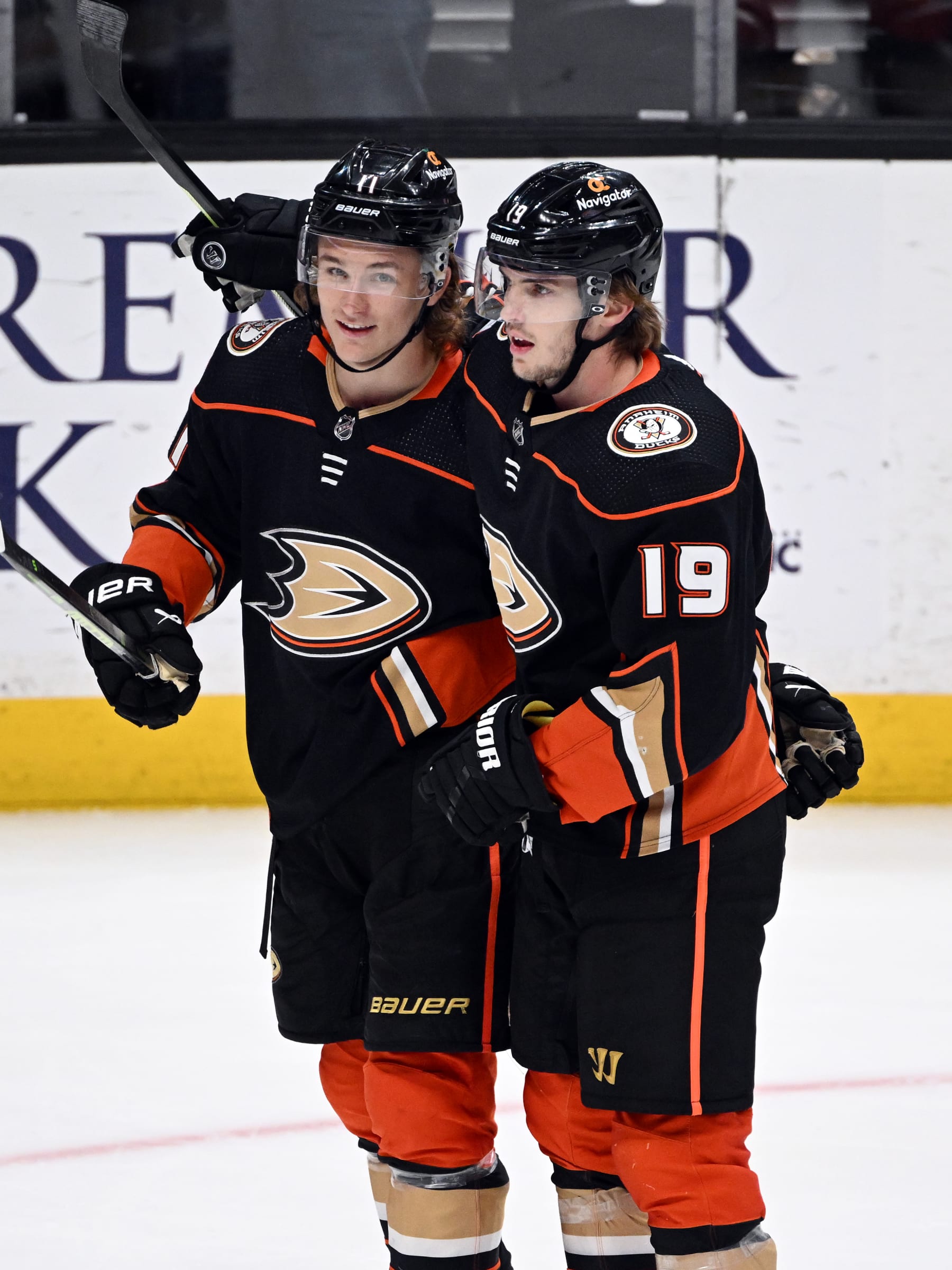 ANAHEIM, CA - APRIL 13: Anaheim Ducks center Trevor Zegras (11) on the ice with right wing Troy Terry (19) after Zebras scored a goal in the third period of an NHL hockey game against the Los Angeles Kings played on April 13, 2023 at the Honda Center in Anaheim, CA. (Photo by John Cordes/Icon Sportswire via Getty Images)