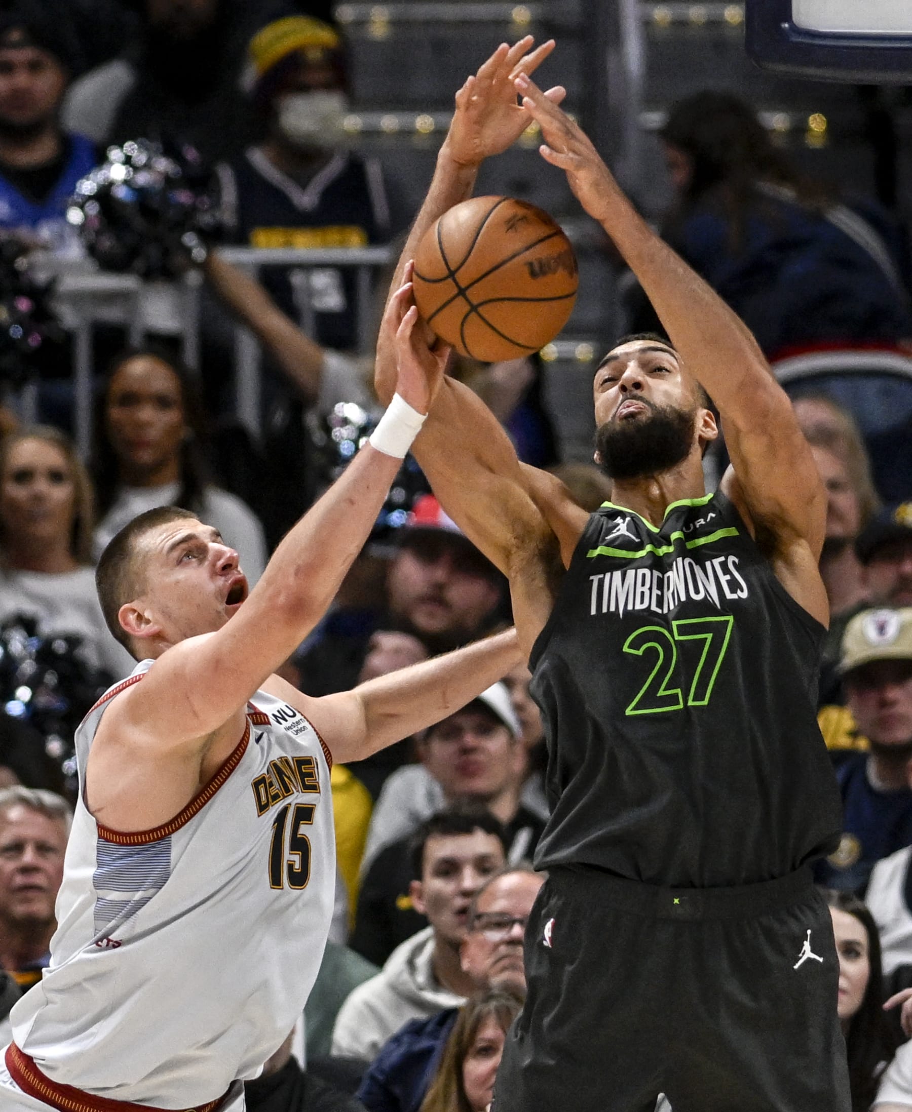 DENVER, CO - APRIL 25: Nikola Jokic (15) of the Denver Nuggets swats a rebound away from Rudy Gobert (27) of the Minnesota Timberwolves during the second quarter at Ball Arena in Denver on Tuesday, April 25, 2023. (Photo by AAron Ontiveroz/MediaNews Group/The Denver Post via Getty Images)