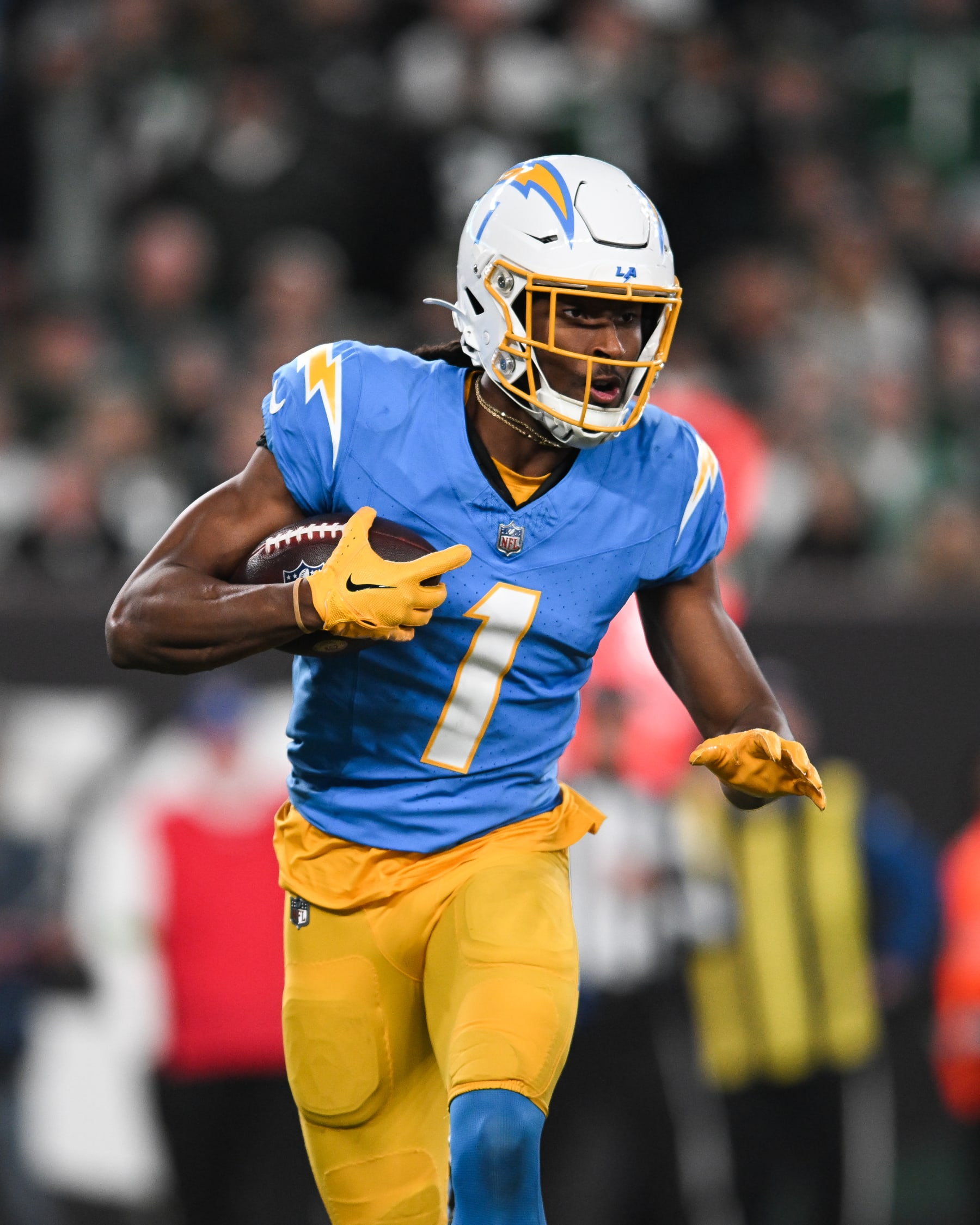 EAST RUTHERFORD, NJ - NOVEMBER 06: Quentin Johnston #1 of the Los Angeles Chargers runs with the football against the New York Jets during the second half at MetLife Stadium on November 6, 2023 in East Rutherford, New Jersey. (Photo by Kathryn Riley/Getty Images)