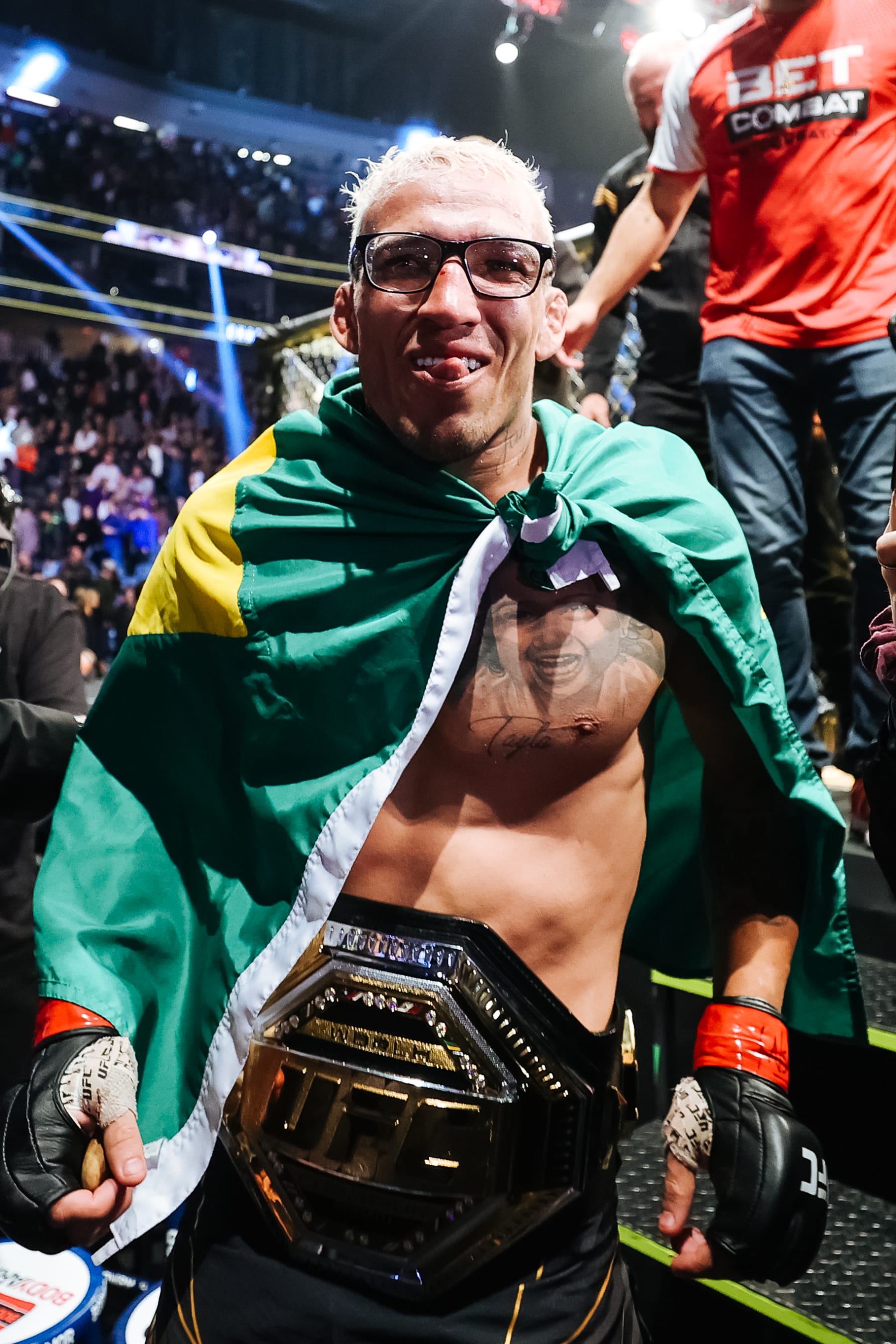 LAS VEGAS, NEVADA - DECEMBER 11: Charles Oliveira of Brazil celebrates after defeating Dustin Poirier to defend his lightweight title during the UFC 269 event at T-Mobile Arena on December 11, 2021 in Las Vegas, Nevada.  (Photo by Carmen Mandato/Getty Images)