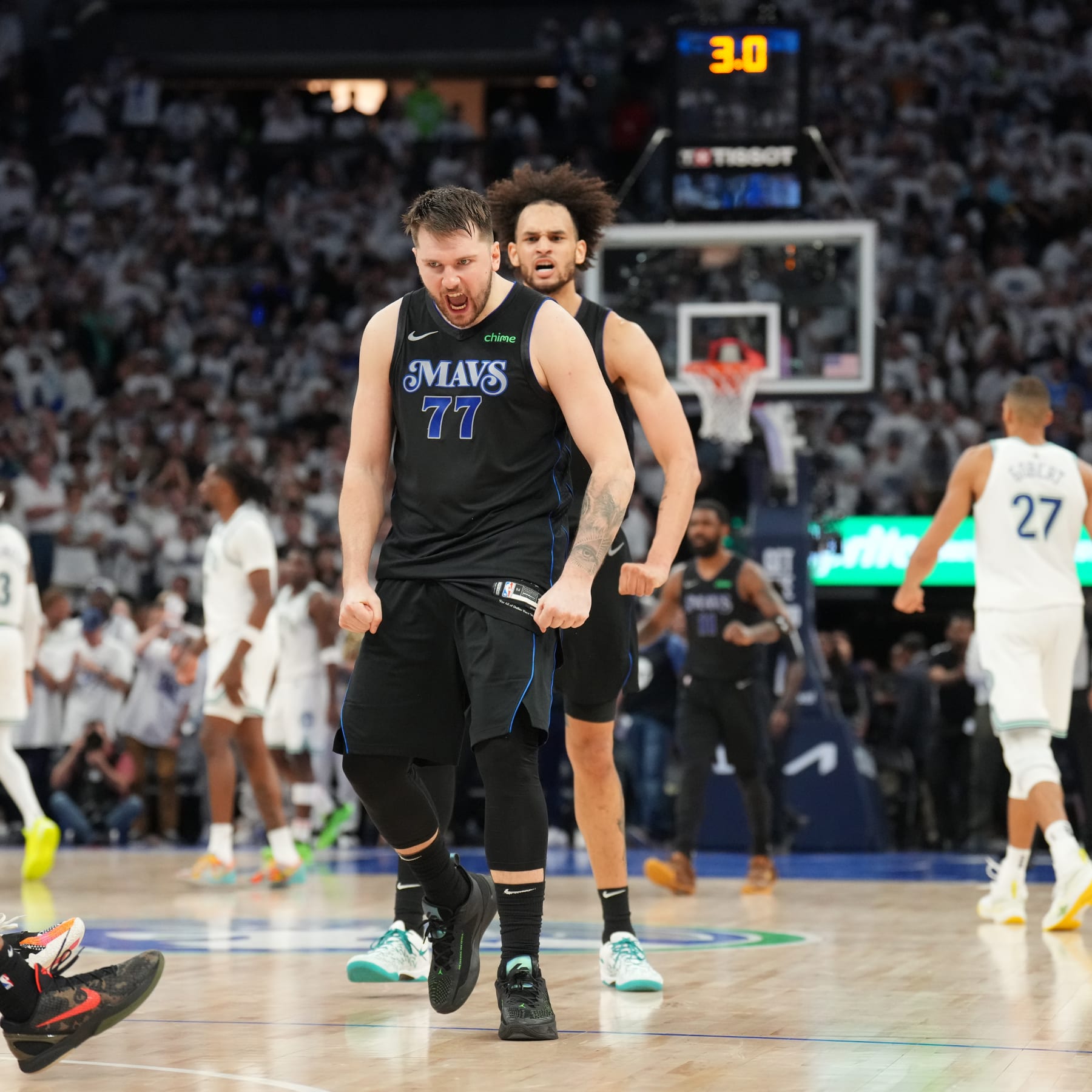 MINNEAPOLIS, MN -  MAY 24: Luka Doncic #77 of the Dallas Mavericks celebrates after scoring the game winning shot against the Minnesota Timberwolves during Game 2 of the Western Conference Finals of the 2024 NBA Playoffs on February 24, 2024 at Target Center in Minneapolis, Minnesota. NOTE TO USER: User expressly acknowledges and agrees that, by downloading and or using this Photograph, user is consenting to the terms and conditions of the Getty Images License Agreement. Mandatory Copyright Notice: Copyright 2024 NBAE (Photo by Jesse D. Garrabrant/NBAE via Getty Images)