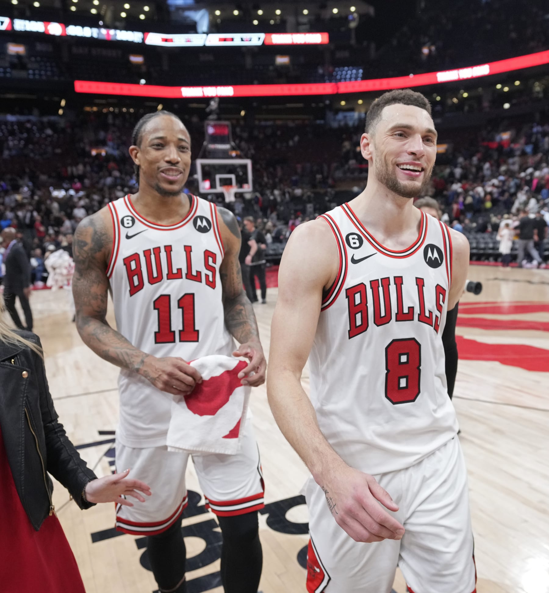 TORONTO, CANADA - APRIL 12: DeMar DeRozan #11 and Zach LaVine #8 of the Chicago Bulls walk off the court after the game against the Toronto Raptors during the 2023 Play-In Tournament on April 12, 2023 at the Scotiabank Arena in Toronto, Ontario, Canada.  NOTE TO USER: User expressly acknowledges and agrees that, by downloading and or using this Photograph, user is consenting to the terms and conditions of the Getty Images License Agreement.  Mandatory Copyright Notice: Copyright 2022 NBAE (Photo by Mark Blinch/NBAE via Getty Images)