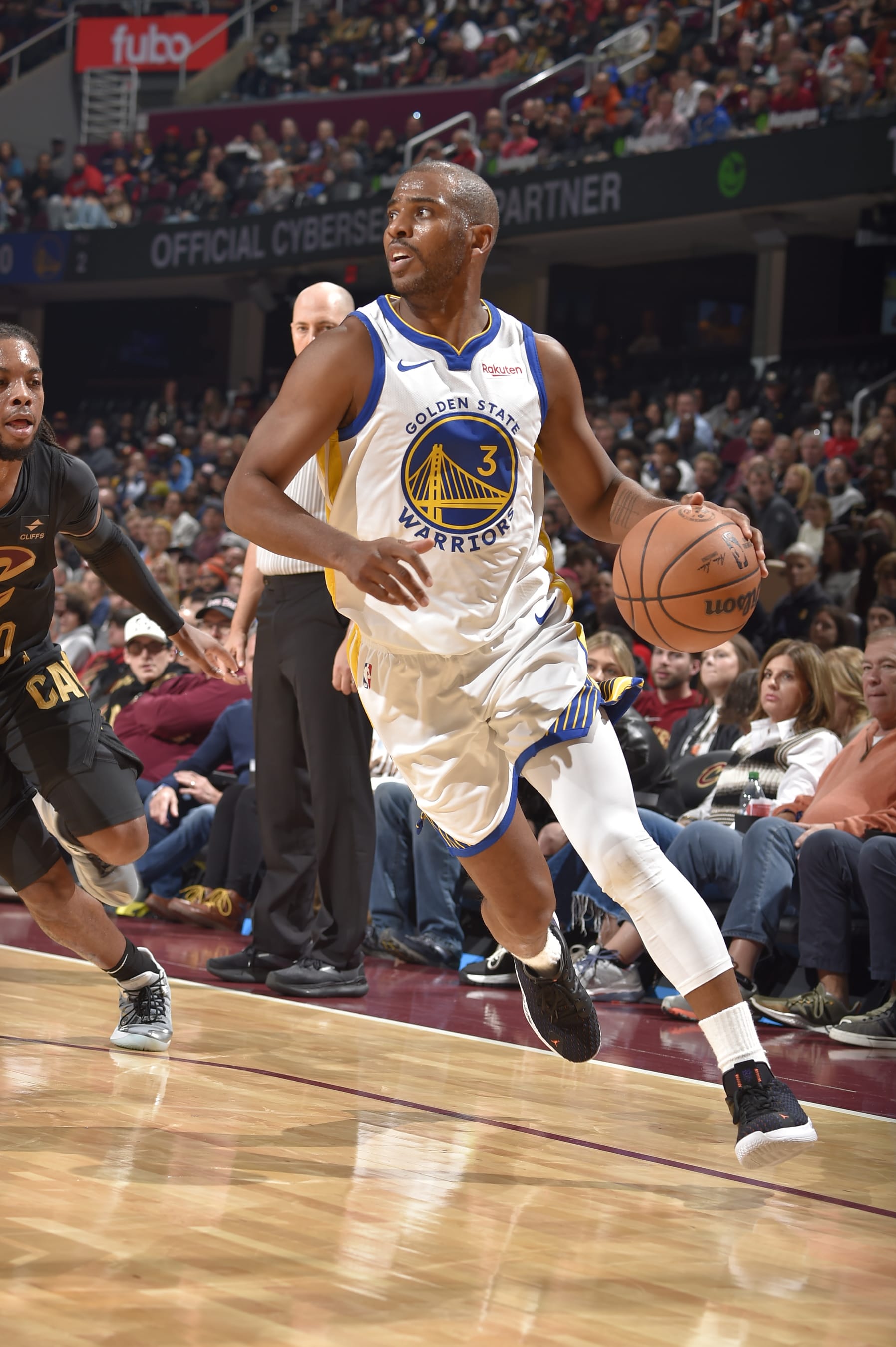 CLEVELAND, OH - NOVEMBER 5: Chris Paul #3 of the Golden State Warriors handles the ball during the game against the Cleveland Cavaliers on November 5, 2023 at Rocket Mortgage FieldHouse in Cleveland, Ohio. NOTE TO USER: User expressly acknowledges and agrees that, by downloading and/or using this Photograph, user is consenting to the terms and conditions of the Getty Images License Agreement. Mandatory Copyright Notice: Copyright 2023 NBAE (Photo by David Liam Kyle/NBAE via Getty Images)