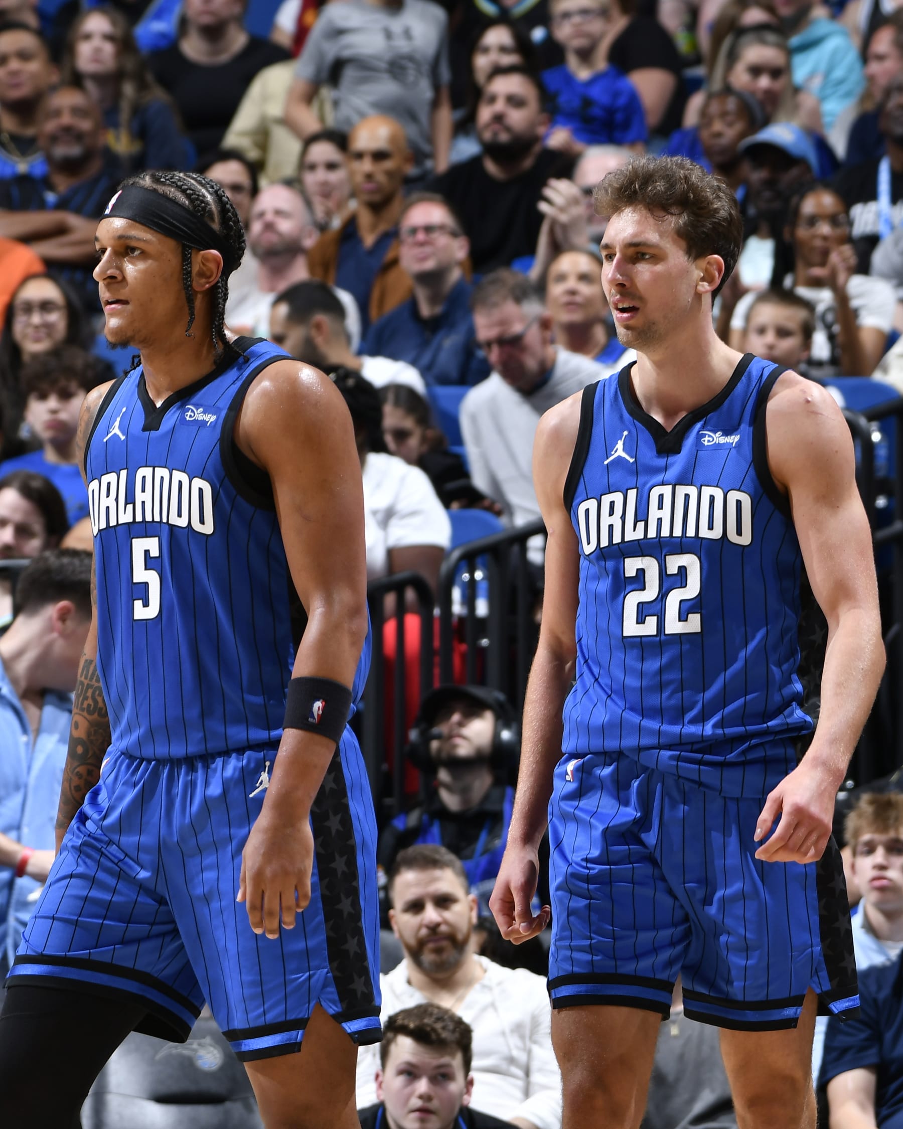 ORLANDO, FL - MARCH 10: Paolo Banchero #5 of the Orlando Magic & Franz Wagner #22 of the Orlando Magic looks on during the game on March 10, 2024 at Kia Center in Orlando, Florida. NOTE TO USER: User expressly acknowledges and agrees that, by downloading and or using this photograph, User is consenting to the terms and conditions of the Getty Images License Agreement. Mandatory Copyright Notice: Copyright 2024 NBAE (Photo by Fernando Medina/NBAE via Getty Images)