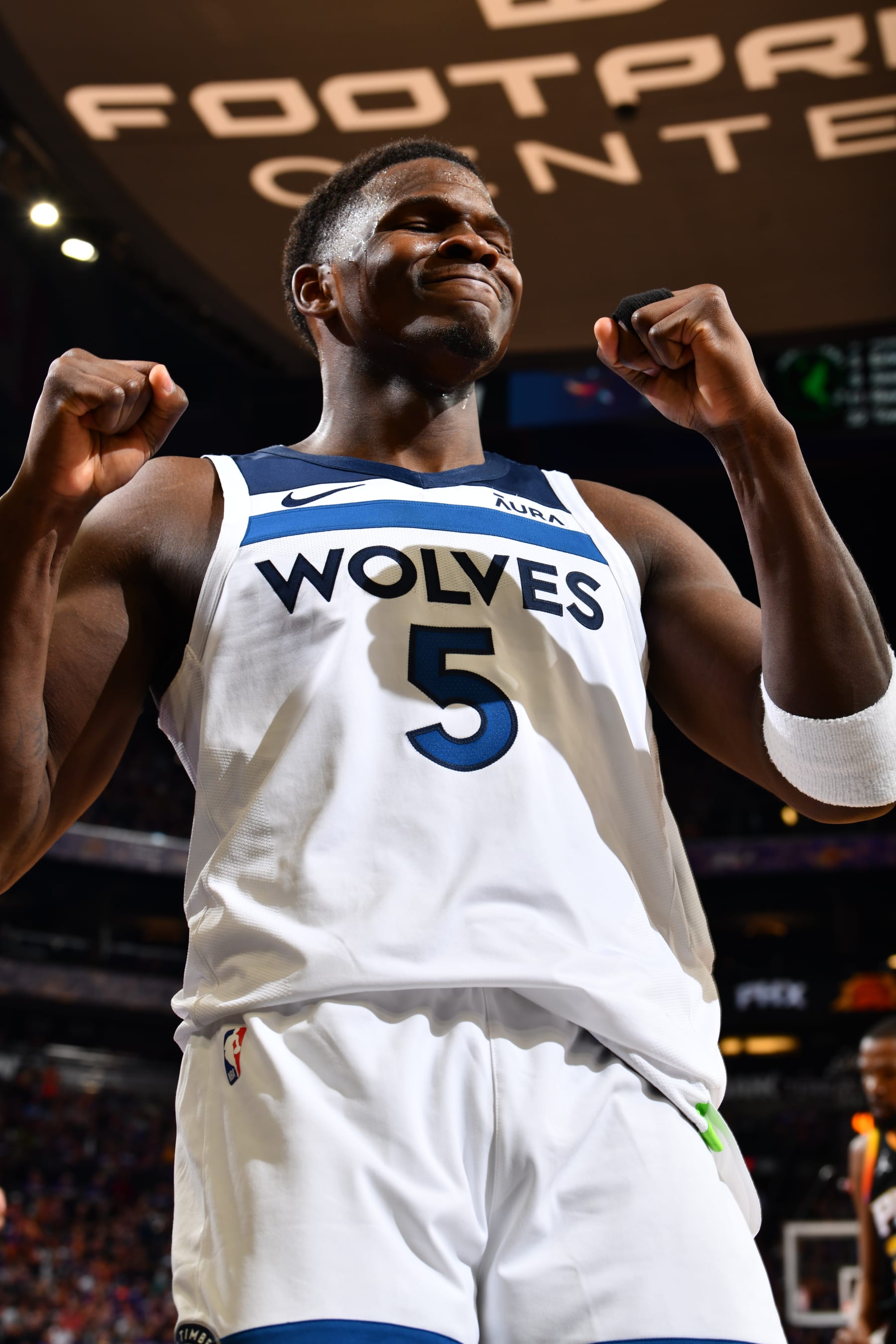 PHOENIX, AZ - APRIL 4: Anthony Edwards #5 of the Minnesota Timberwolves celebrates during the game against the Phoenix Suns during Round 1 Game 4 of the 2024 NBA Playoffs on April 4, 2023 at Footprint Center in Phoenix, Arizona. NOTE TO USER: User expressly acknowledges and agrees that, by downloading and or using this photograph, user is consenting to the terms and conditions of the Getty Images License Agreement. Mandatory Copyright Notice: Copyright 2024 NBAE (Photo by Barry Gossage/NBAE via Getty Images)