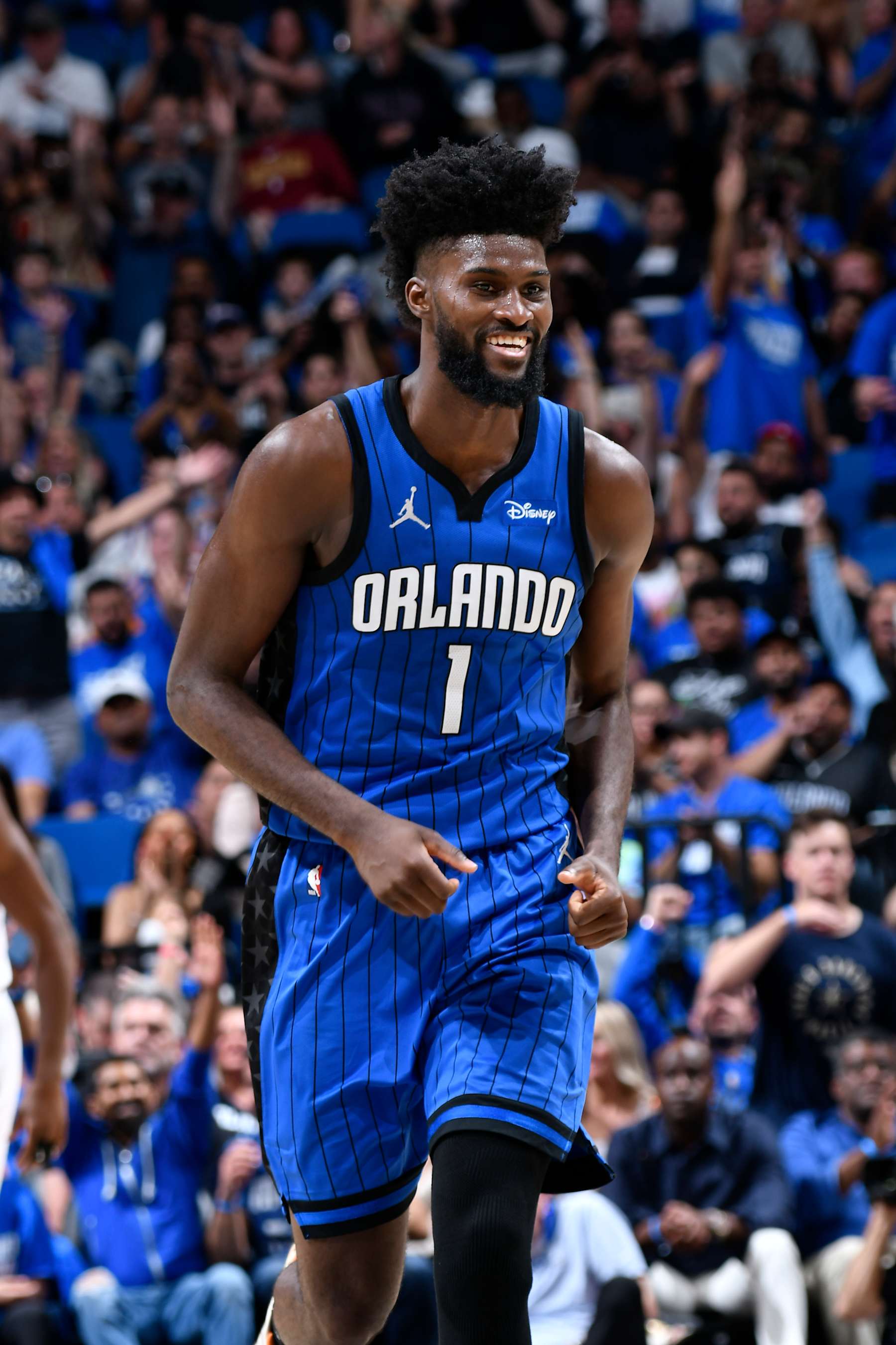 ORLANDO, FL - APRIL 27: Jonathan Isaac #1 of the Orlando Magic smiles during the game against the Cleveland Cavaliers during Round 1 Game 4 of the 2024 NBA Playoffs on April 27, 2024 at the Kia Center in Orlando, Florida. NOTE TO USER: User expressly acknowledges and agrees that, by downloading and or using this photograph, User is consenting to the terms and conditions of the Getty Images License Agreement. Mandatory Copyright Notice: Copyright 2024 NBAE (Photo by Fernando Medina/NBAE via Getty Images)